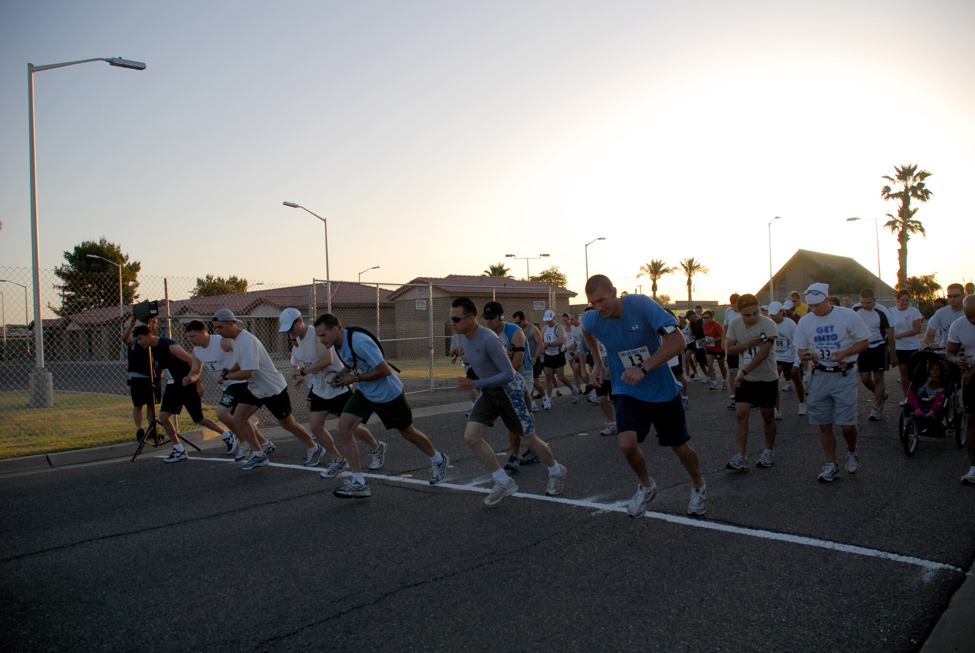 Luke Airmen begin to run the 13.2 mile marathon held at the Base Fitness Center, May 3. The half marathon consisted of more than 50 Airmen, retirees, and children from Luke Air Force Base who ran more than 660 miles combined. (U.S. Air Force photo/Airman 1st Class Tracie Forte)