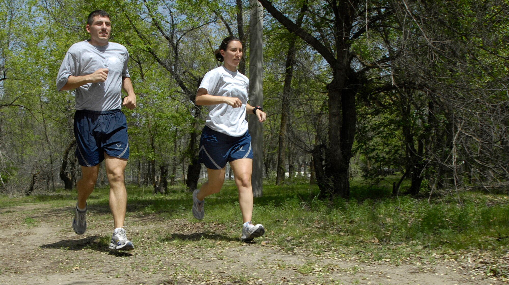 (04/22/08) 1st Lieutenants Craig and Catherine Christ, KC-135 Stratotanker pilots, 22nd Expeditionary Air Refueling Squadron, Manas Air Base, Kyrgyz Republic, train for the Ford Ironman USA Coeur d'Alene on June 22, 2008. The lieutenants average about 25 hours a week in the sky and 13 hours training.  (U.S. Air Force/SrA Tabitha Kuykendall)