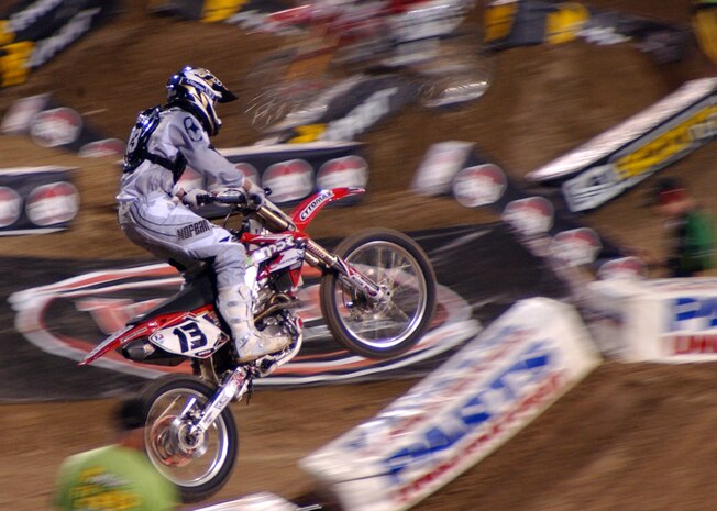 Heath Voss,western region supercross competitor, races during the first heat, placing 5th in the heat, for the soldout 2008 Monster Energy Supercross Championship held at Sam Boyd Stadium May 5, Las Vegas, Nev.  Although not financially supported by the U.S. Air Force,  Voss displays the Air Force logo in various places on his bike, equipment, and trailer to show his support and admiration for the U.s. Air Force. he finsihed 12th in the race, 11th in the series, and was the world supercorss champion in 2004.(U.S. Air Force photo/Airman 1st Class Ryan Whitney)