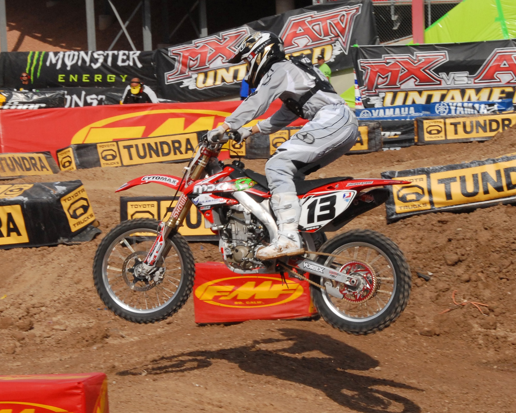 LAS VEGAS--Heath Voss, a top rider in the American Motorcyclist Association Supercross racing series, goes airborne over a jump during qualifying for the final round of the 2008 Supercross championship in Las Vegas, May 3. Mr. Voss carries the Air Force logo on his bike, uniforms and transporter even though he receives no official sponsorship from the Air Force. (U.S. Air Force photo/Chief Master Sgt. Gary Emery)