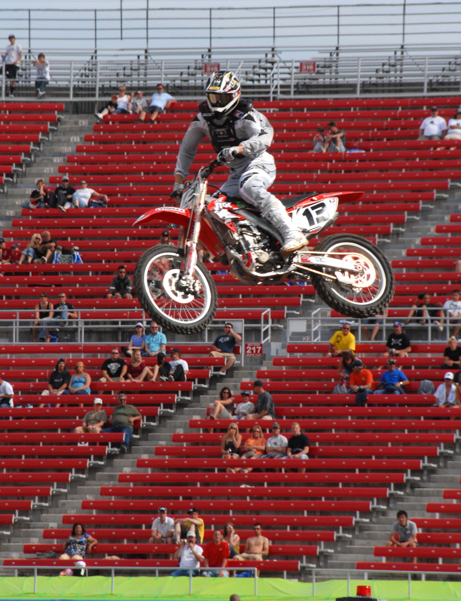 LAS VEGAS--American Motorcyclist Association Supercross rider Heath Voss soars over Sam Boyd Stadium in Las Vegas May 3 while qualifying for the final Supercross event of the season. Supercross, an extreme sport considered one of the most physically demanding sports in the world, requires riders to negotiate obstacles and jumps at speeds of more than 80 mph.  Riders, usually in heavy traffic, often reach heights of 35 feet on jumps of 90 feet or more. (U.S. Air Force photo/Chief Master Sgt. Gary Emery)