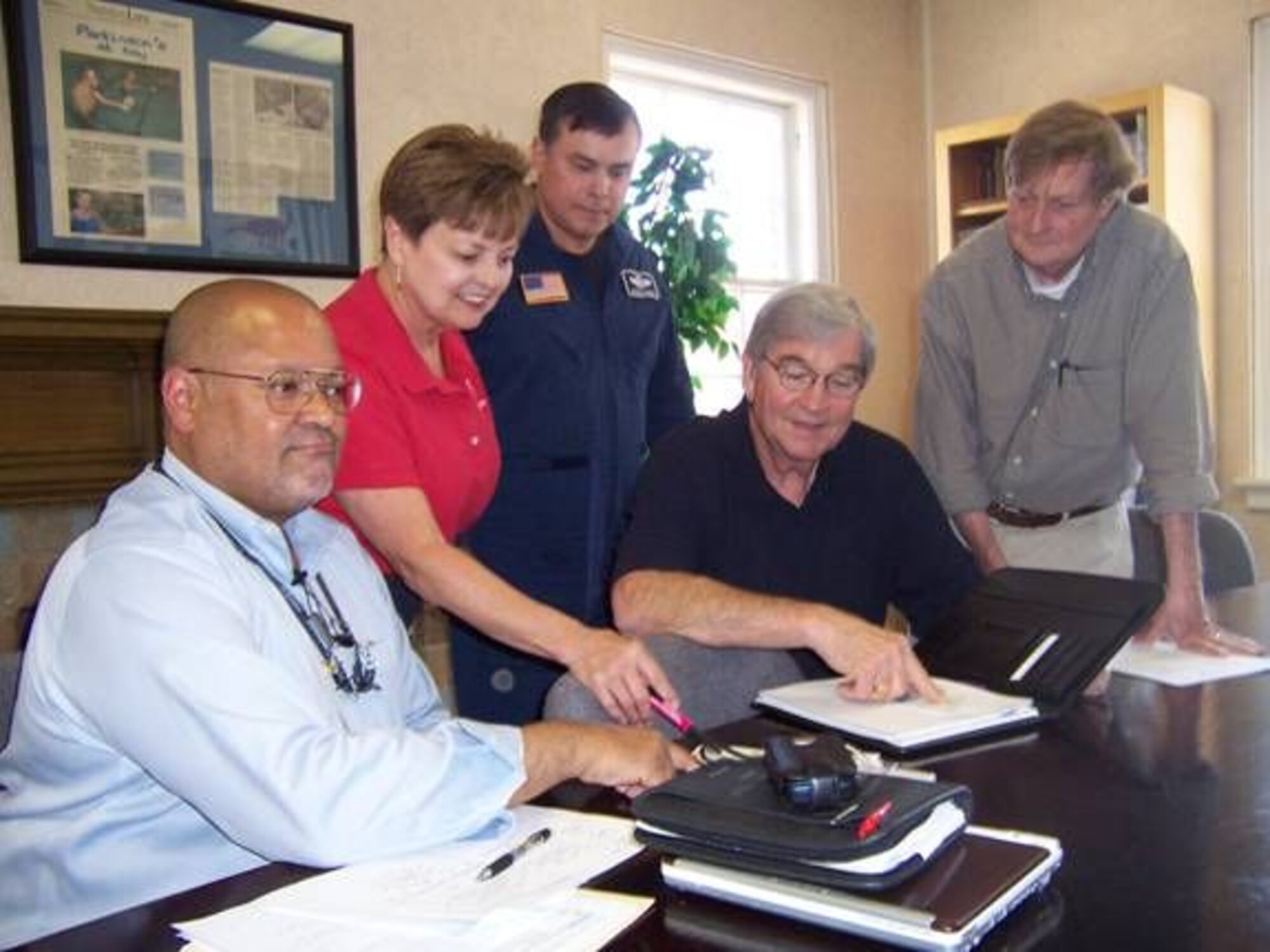The new Base Community Council officers for 2008 are Mr. Greg Stewart, President, Mrs. Barbara Bigelow, Treasurer, retired Col. Buck Burgess, Vice President. Also pictured are Mr. Bobby Harper, out-going President and Mr. Rufus Ward, Treasurer. (U.S. Air Force photo by Sonic Johnson)
