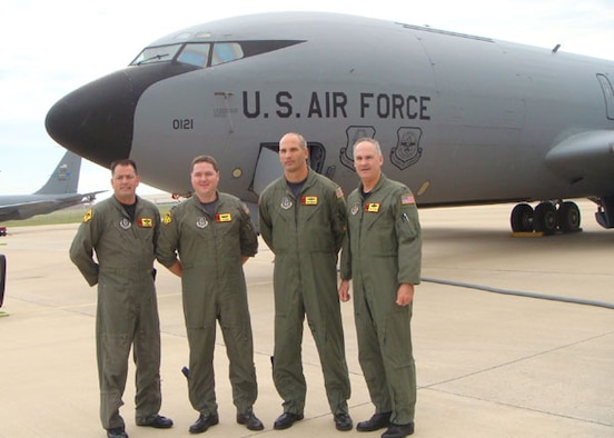 Members of "Okie 41" were recently awarded by the Air Force Reserve Command for their efforts providing aerial refueling support during a search and rescue effort for a downed F-16 pilot in 2007.  The crew pictured are, left to right, Chief Master Sgt. Steven Robinson, Capt. Jeffrey Milburn, Maj. Michael Remualdo, and Col. Randall Guthrie. The crew was presented with the Command’s Aviation Well Done Award by AFRC Commander Lt. General John Bradley on May 4.                      