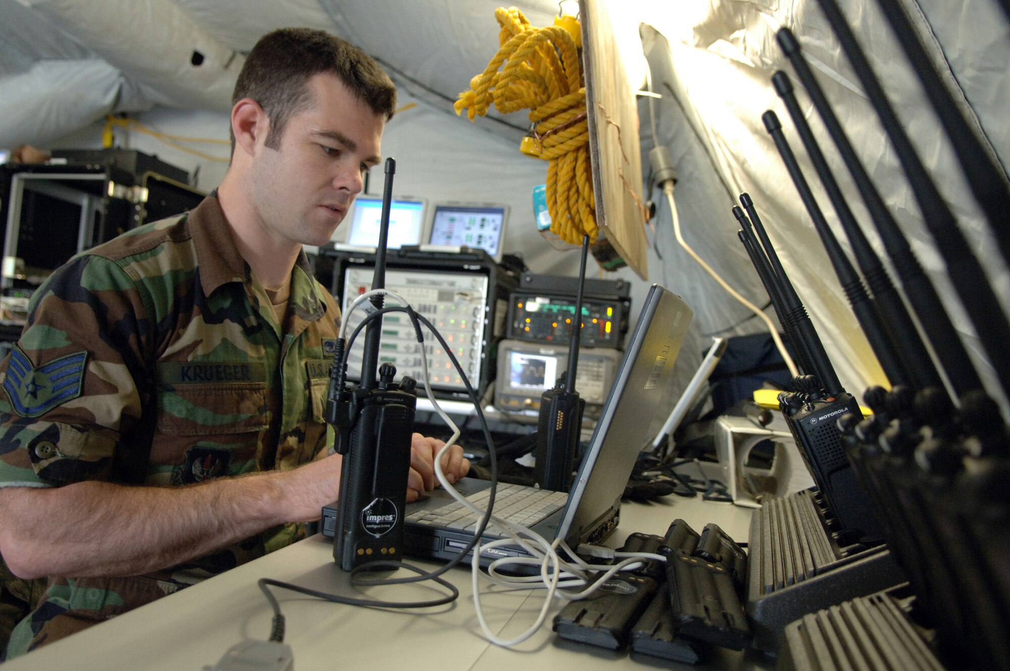 LORA NAVAL STATION, SPLIT, Croatia - U.S. Air Force Staff Sgt. Brandon Krueger, radio technician supervisor, 1st Combat Communications Squadron from Ramstein Air Base, Germany, programs radios to be used during exercise Combined Endeavor, Lora Naval Station, Croatia, April 29.  More than 40 participating nations use Combined Endeavor to plan, prepare and practice using a full range of communications equipment, policies, and procedures prior to deploying for NATO missions and emerging, real world situations such as the evacuation of Lebanon and response to natural disasters. (U.S. EUCOM photo by U.S. Air Force Airman 1st Class Kelly LeGuillon) (RELEASED)