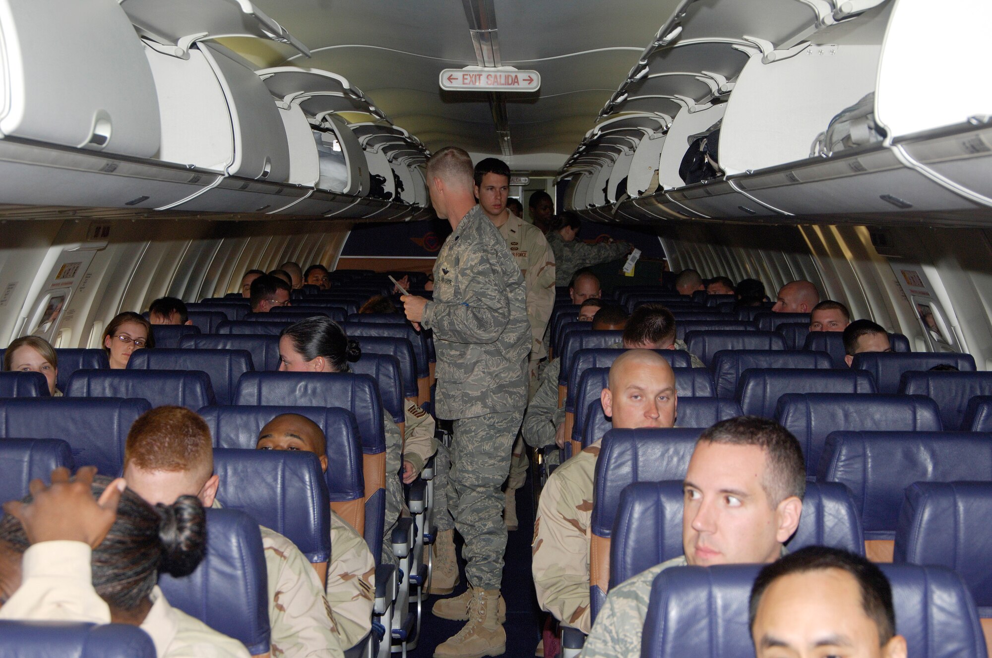 SCOTT AIR FORCE BASE, Ill. --Airmen deploying from Scott Air Force Base find their seats after boarding Southwest Airlines plan May 1 that will take them to their specific deployed 1ocations around the world. (U.S. Air Force photo/Airman 1st class Wesley Farnsworth)