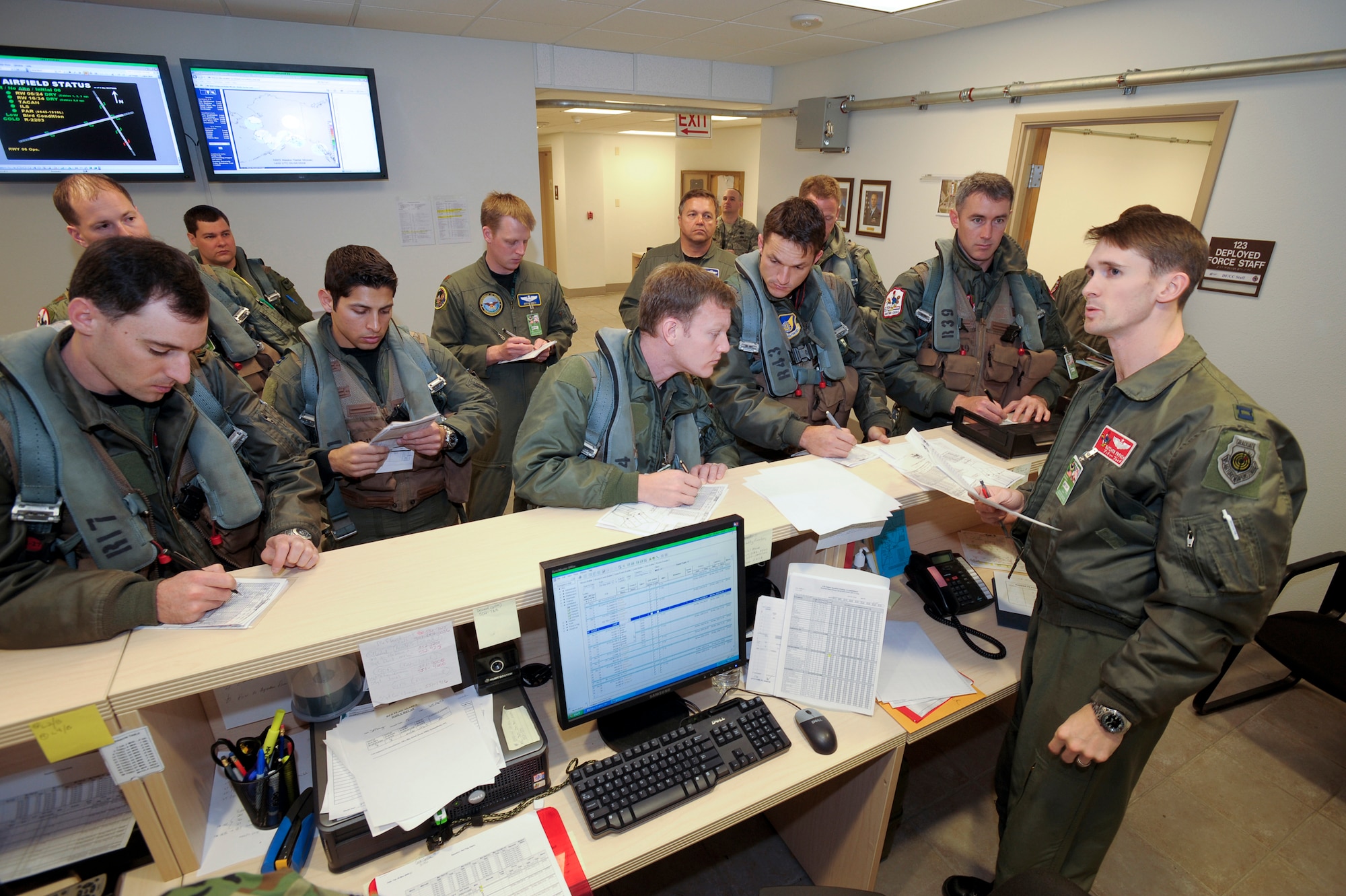 Elmendorf Air Foce Base, Alaska -- Capt. Matthew French briefs pilots prior to stepping to aircraft for the start of the flying day during Northern Edge '08. Captain French, and F-15 pilot, is assigned to the 67th Fighter Squadron, Kadena Air Force Base, Japan.  U.S. Military units stationed in the continental United States and the Pacific theater will participate in exercise Northern Edge 2008, a joint training exercise hosted by Alaskan Command scheduled for May 5-16. Approximately 5,000 Active Duty, Guard and Reserve component Soldiers, Sailors, Airman, Coast Guardsmen, and Marines will participate with over 120 aircraft from all the Services. (U.S. Air Force Photo by Master Sgt Keith Brown