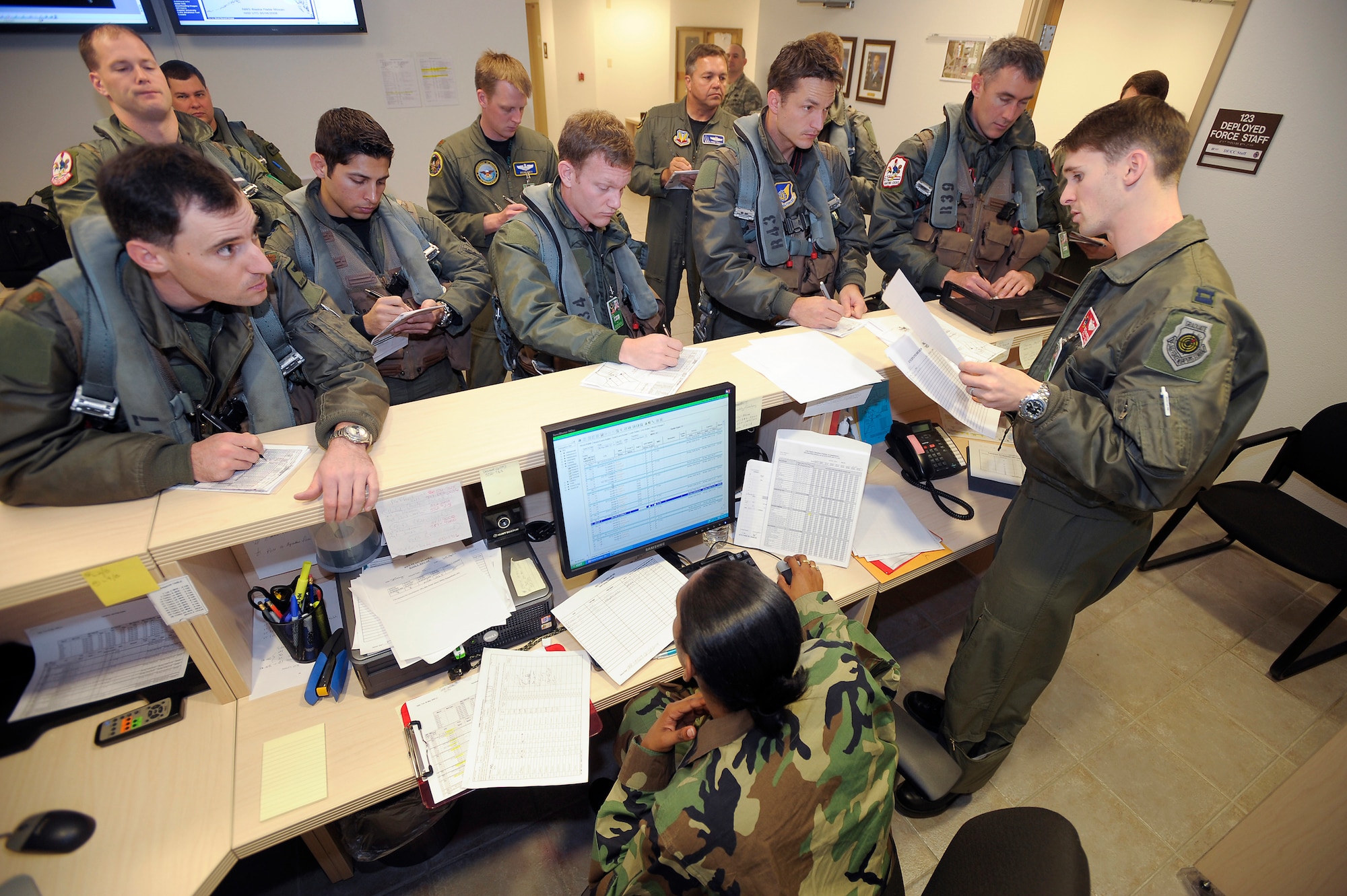 Elmendorf Air Foce Base, Alaska -- Capt. Matthew French briefs pilots prior to stepping to aircraft for the start of the flight day during Northern Edge '08. Captain French, and F-15 pilot, is assigned to the 67th Fighter Squadron, Kadena Air Force Base, Okinawa, Japan.  U.S. Military units stationed in the continental United States and the Pacific theater will participate in exercise Northern Edge 2008, a joint training exercise hosted by Alaskan Command scheduled for May 5-16. Approximately 5,000 Active Duty, Guard and Reserve component Soldiers, Sailors, Airman, Coast Guardsmen, and Marines will participate with over 120 aircraft from all the Services. (U.S. Air Force Photo by Master Sgt Keith Brown)