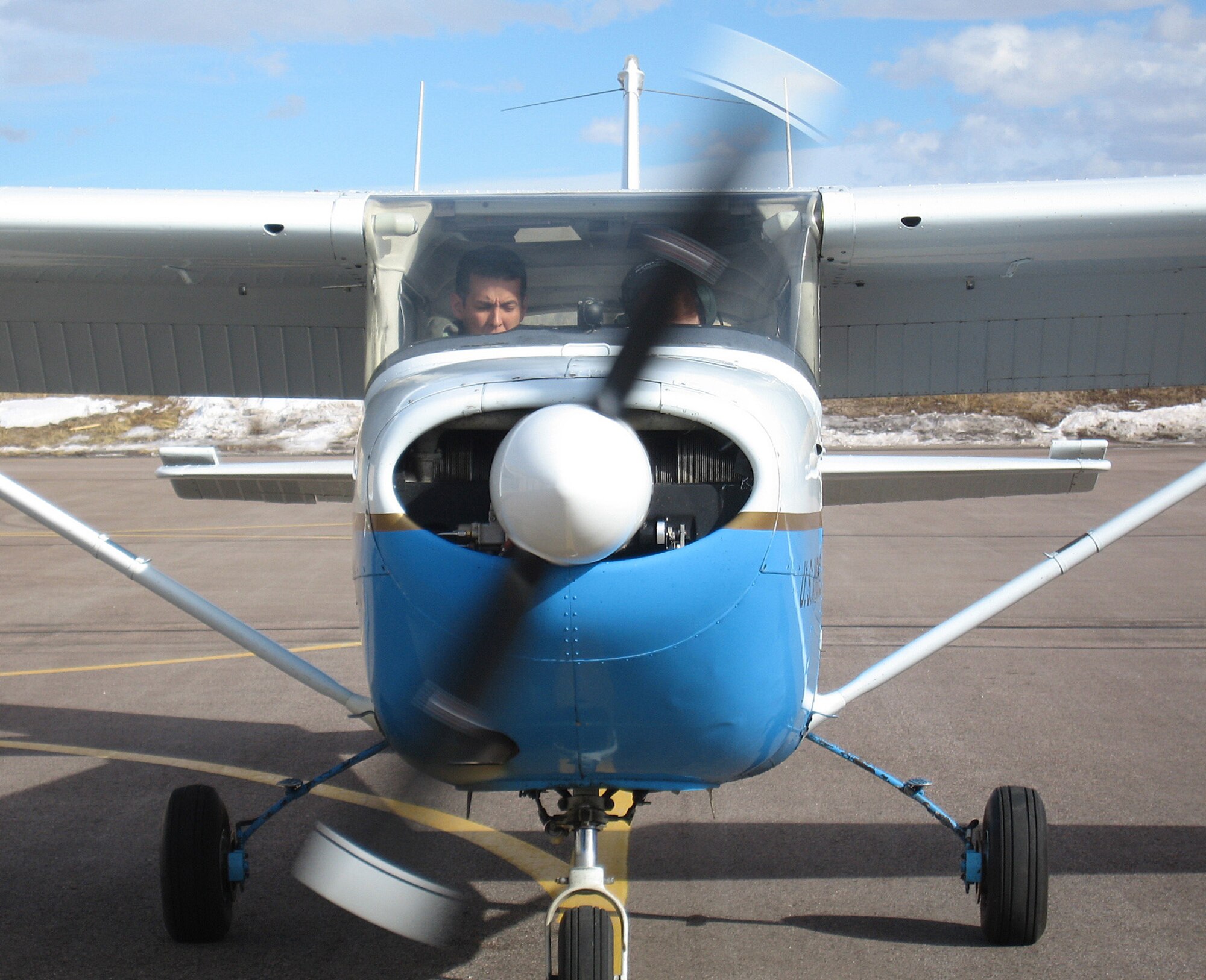 Flying in the T-41 Mescalero, Capt. Steve Priddy and Cadet 2nd Class Brooke Mauss prepare to take off at the Air Force Academy, Colo., Feb. 1. Priddy is an instructor pilot with the 557th Flying Training Squadron and Mauss is a member of Cadet Squadron 5 participating in the “Jump Start” test program, which marks the return to powered flight at the academy. (Photo by Staff Sgt. Michael R. Holzworth)