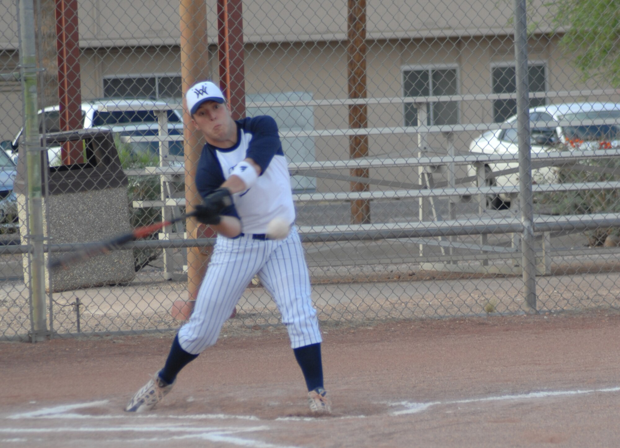 Josh Samples, FWCONS outfielder, blast a double off ECS in the first inning of the FWCONS vs. ECS intramural softball game May 6. FWCONS won the game 19-4.  