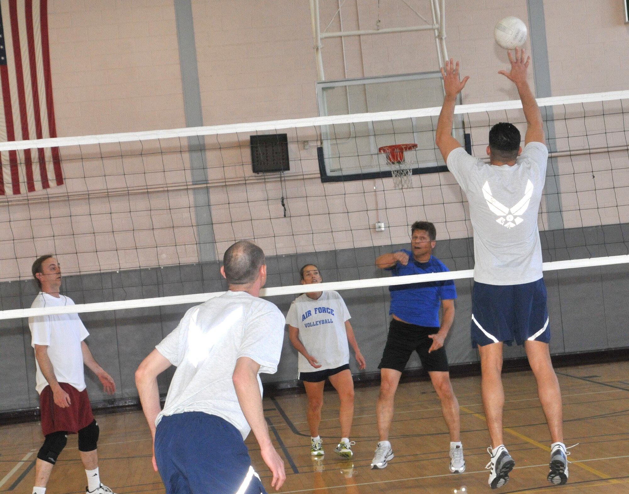 Members of Air Force Space Command's intramural volleyball team get in a practice session May 1 at the Peterson Fitness and Sports Center in preparation for the upcoming base volleyball championships. (CSMNG photo/Walt Johnson)
