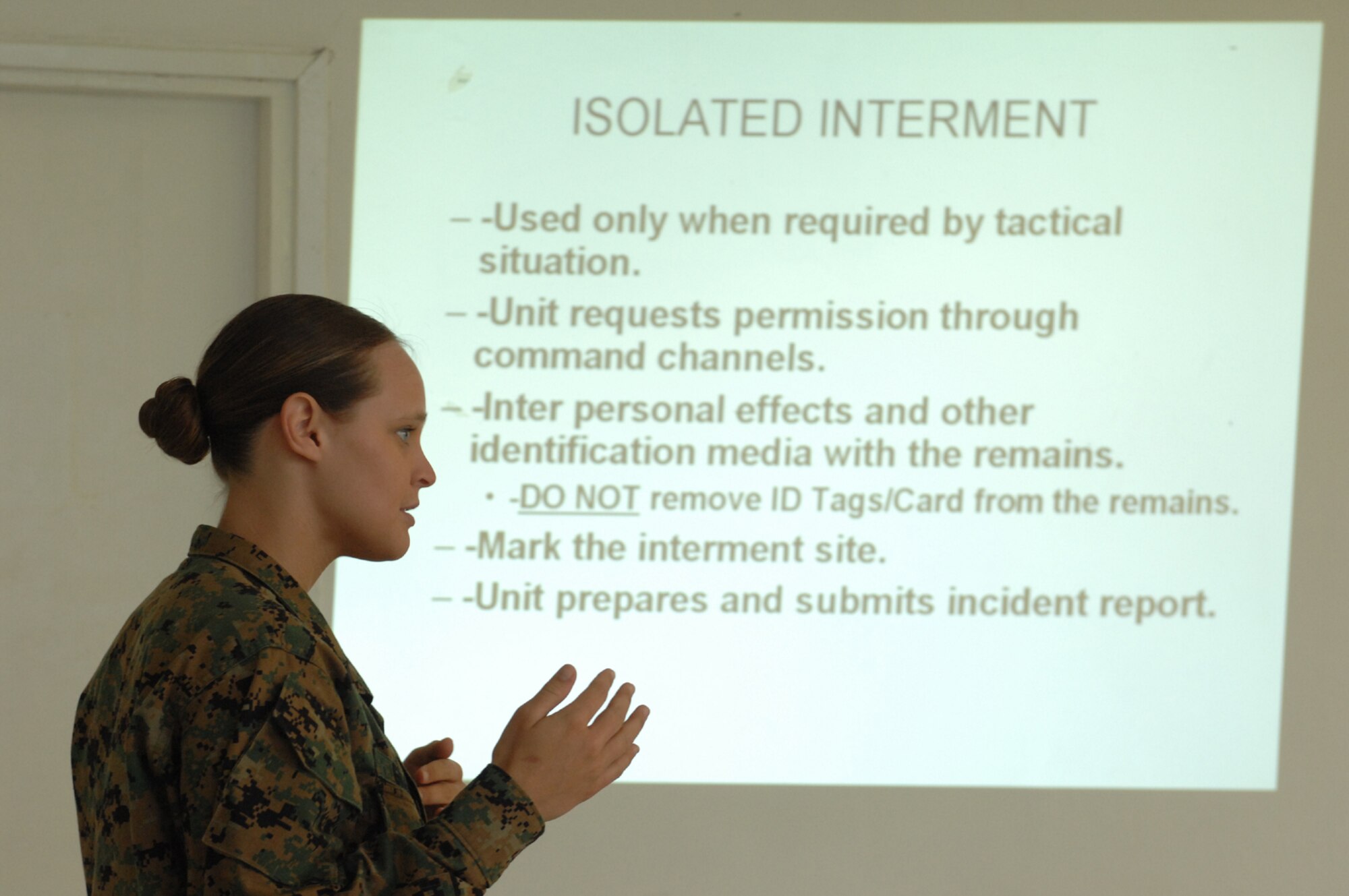 DIVULJE TRAINING BASE, Croatia – U.S. Marine Corps Reserve Cpl. Crystal Green explains interment procedures May 6 during the 2008 Medical Training Exercise in Central and Eastern Europe (MEDCEUR).  The Mortuary Affairs training course is one of eleven courses offered during MEDCEUR.  Fifteen nations are participating in the exercise from May 2 through 14. The exercise focuses on mass-casualty training scenarios and humanitarian aid in response to crises situations. MEDCEUR is a Joint Chiefs of Staff regional/multilateral exercise sponsored by U.S. European Command. Croatia is hosting the 2008 exercise which has drawn about 400 multi-nationals in support of the Partnership for Peace initiative. (U.S. Air Force photo/Staff Sgt. Kristin Ruleau) 