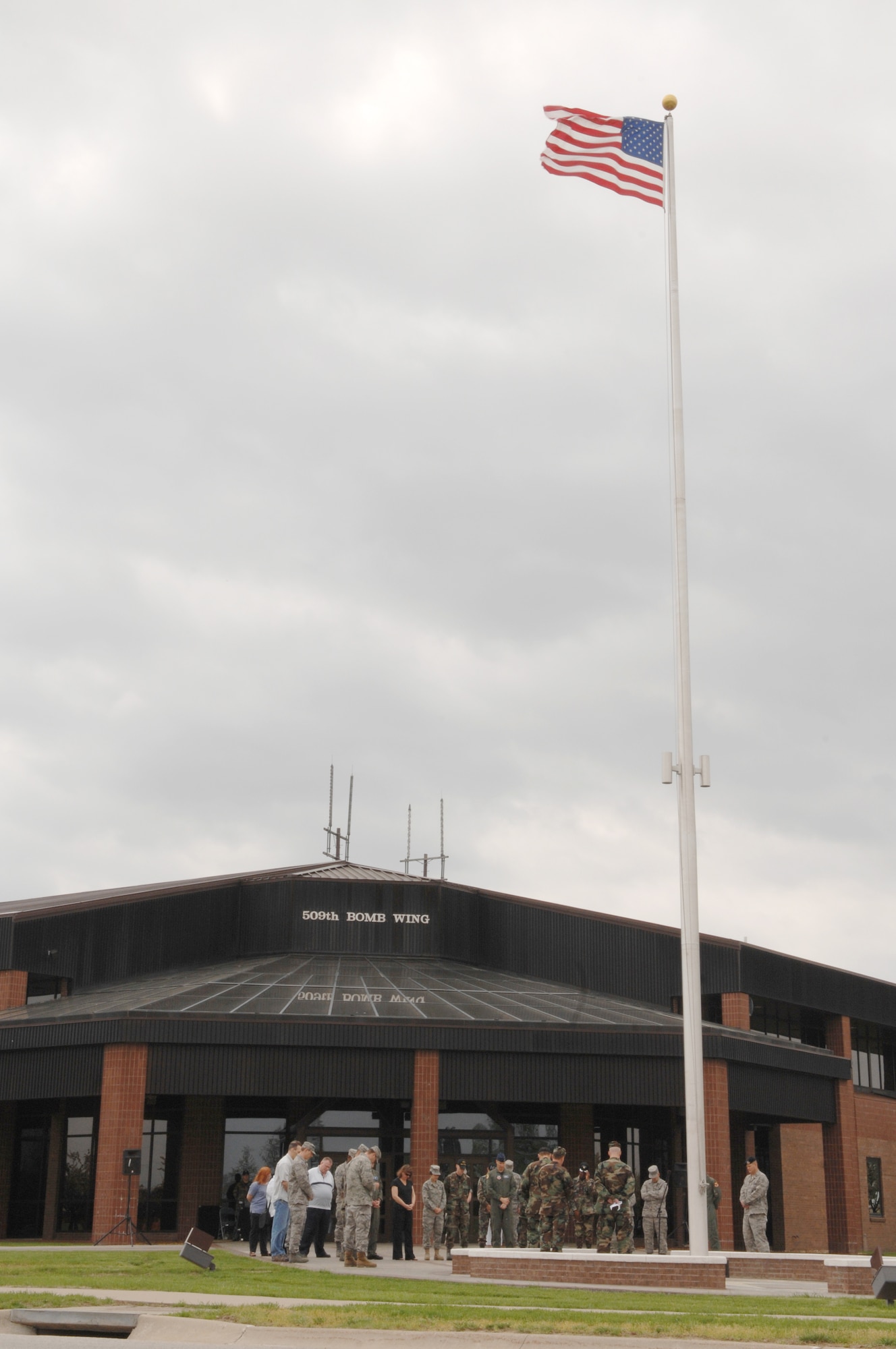 WHITEMAN AIR FORCE BASE, Mo. - Members of Team Whiteman gather outside the 509th Bomb Wing Headquarters building May 1 to honor the National Day of Prayer. People nationwide, regardless of their faith ,are encouraged to come together and pray in their own way.  (U.S. Air Force photo/Senior Airman Jessica Snow)