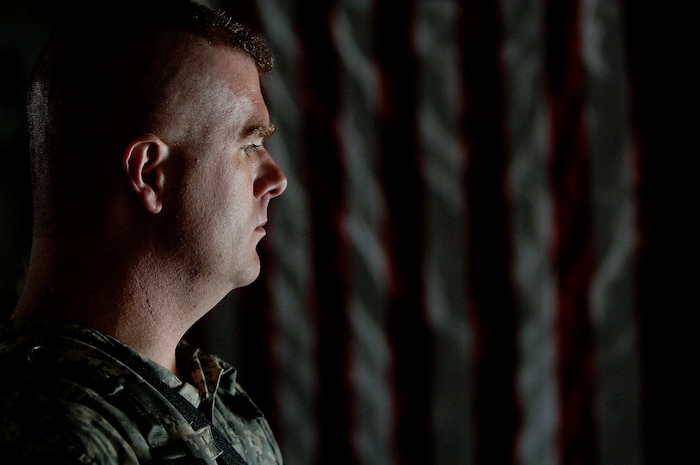 Tim Brooder waits to walk off a C-17 Globemaster III during the filming of the Lifetime TV drama, "Army Wives," on the Charleston AFB flightline May 5. Mr. Brooder, playing an Army Soldier, is a civilian from Charleston who was hired as an extra for the show. (U.S. Air Force photo/Senior Airman Nicholas Pilch)