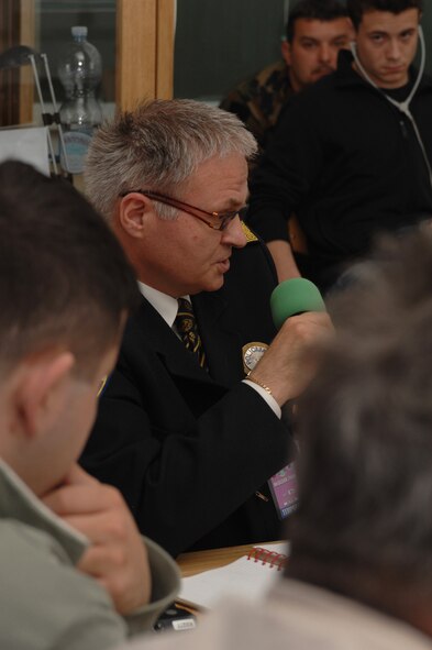 Croatian Chief of Police for the city of Split, Ninoslav Curic, shares emergency management procedures May 3 during the 2008 Medical Training Exercise in Central and Eastern Europe. The Emergency Management course is one of eleven courses offered during MEDCEUR. The involvement of the Croatian emergency services adds a realistic touch to the exercise. Fifteen nations are participating in the exercise now through 14. The exercise focuses on mass-casualty training scenarios and humanitarian aid in response to crises situations. MEDCEUR is a Joint Chiefs of Staff regional/multilateral exercise sponsored by U.S. European Command.  (U.S. Air Force photo/Staff Sgt. Kristin Ruleau) 