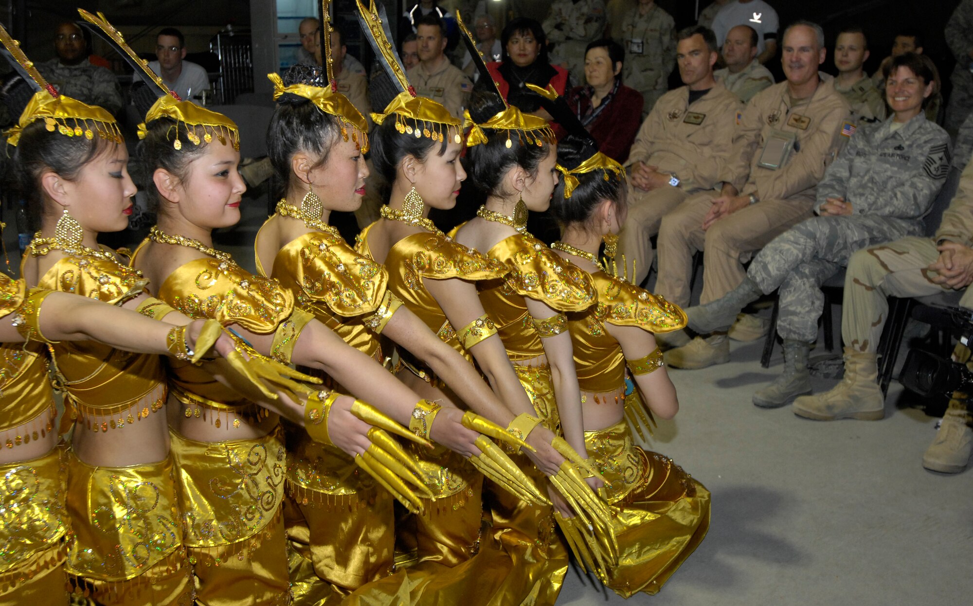 (05/05/08) Students from the local Bishkek, Kyrgyz Republic Boarding School for the Deaf, visit with Manas Air Base Airmen to show their appreciation and give back to base volunteers for helping better the lives of the students and the facility through construction projects and donations.  The high school seniors performed unique dances for the Airmen at Pete's Place while others played soccer with base Airmen at the fitness center. (U.S. Air Force/SSgt Tabitha Kuykendall)