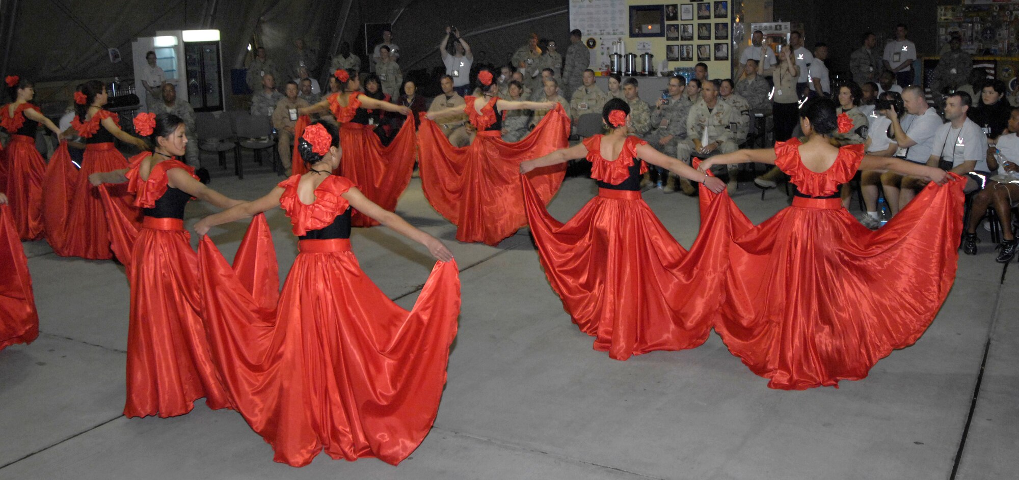 (05/05/08) Students from the local Bishkek, Kyrgyz Republic Boarding School for the Deaf, visit with Manas Air Base Airmen to show their appreciation and give back to base volunteers for helping better the lives of the students and the facility through construction projects and donations.  The high school seniors performed unique dances for the Airmen at Pete's Place while others played soccer with base Airmen at the fitness center. (U.S. Air Force/SSgt Tabitha Kuykendall)