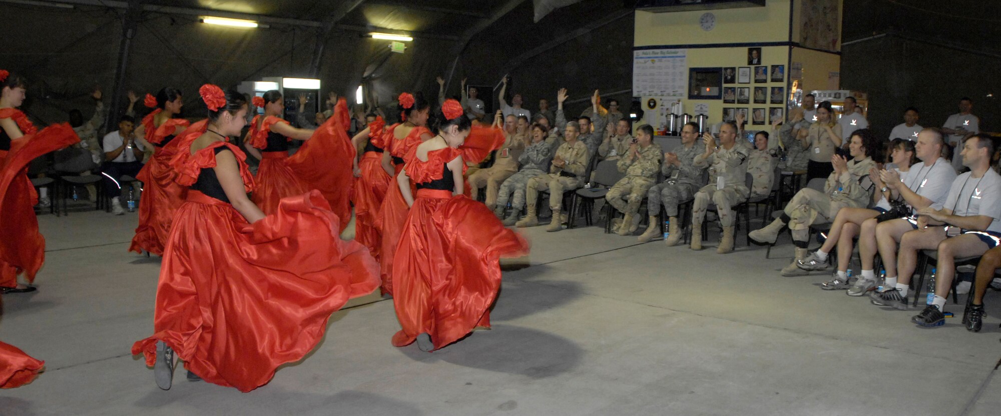 (05/05/08) Students from the local Bishkek, Kyrgyz Republic Boarding School for the Deaf, visit with Manas Air Base Airmen to show their appreciation and give back to base volunteers for helping better the lives of the students and the facility through construction projects and donations.  The high school seniors performed unique dances for the Airmen at Pete's Place while others played soccer with base Airmen at the fitness center. (U.S. Air Force/SSgt Tabitha Kuykendall)