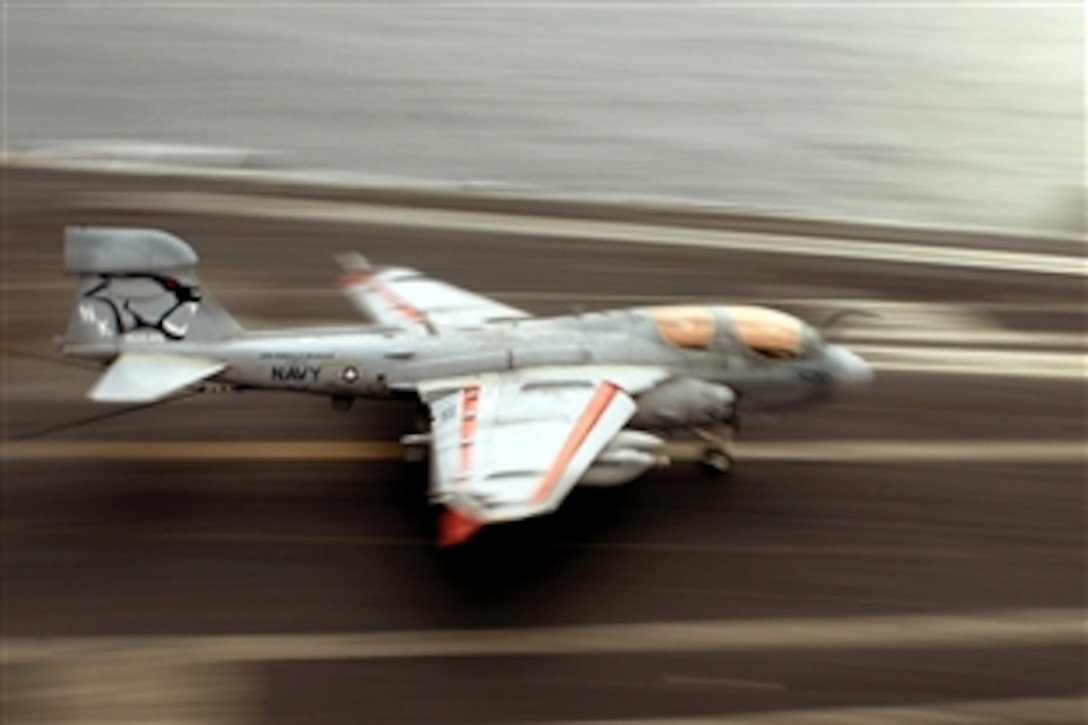 An EA-6B Prowler assigned to the "Cougars" of Tactical Electronic Warfare Squadron 139 makes an arrested landing on the flight deck of the aircraft carrier USS Ronald Reagan, April 3, 2008. 

