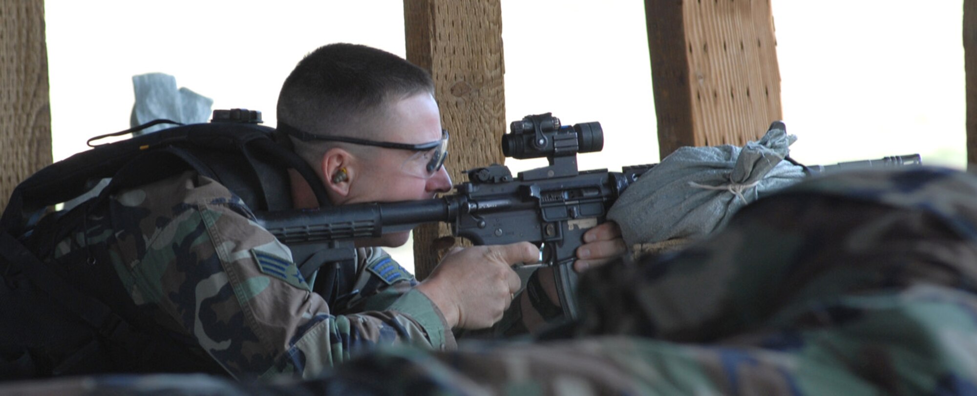 Senior Airman Matthew Masciorini, a member of Buckley's Security Forces Guardian Challenge team, fires his M-4 during the firing portion of the 2008 Guardian Challenge held at Peterson Air Force Base, Colo., May 1. (U.S. Air Force photo by Senior Airman Michelle Lee Cross Furtado)