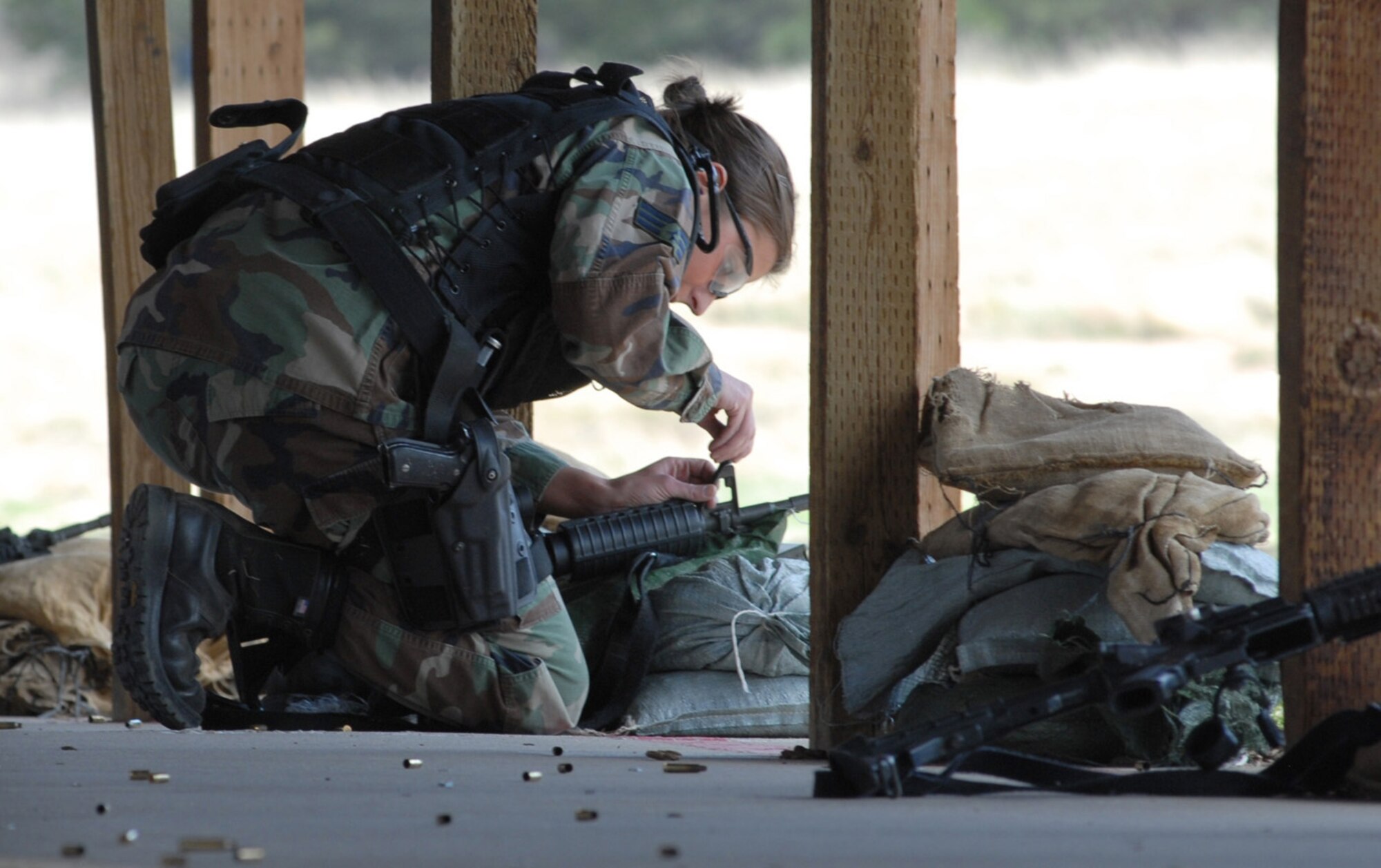 Senior Airman Amanda Nye, a member of Buckley's Security Forces Guardian Challenge team, adjusts the sights on her M-4 during the firing portion of the 2008 Guardian Challenge held at Peterson Air Force Base, Colo., May 1. (U.S. Air Force photo by Senior Airman Michelle Lee Cross Furtado)
