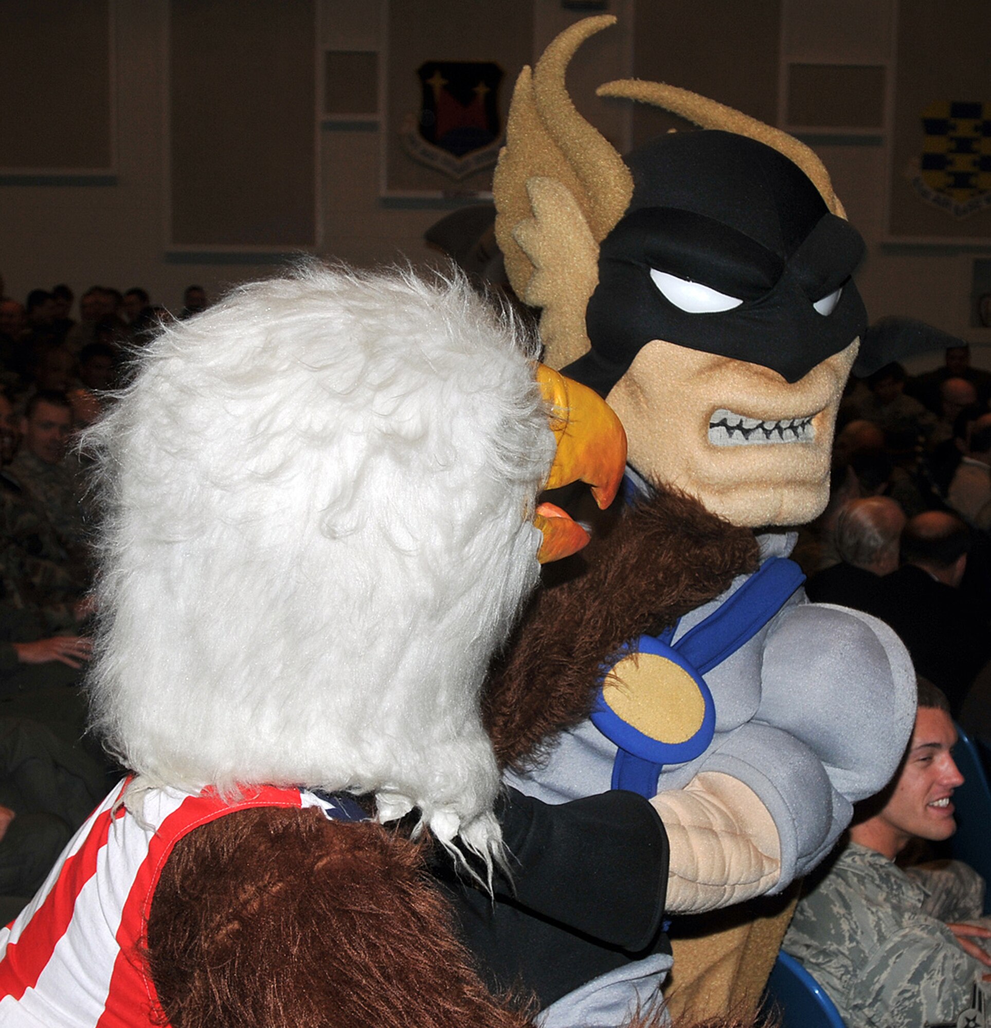 Hawkman, the mascot of the 30th Space Wing, based at Vandenberg Air Force Base, Calif., takes on a rival wing mascot May 8 during the Guardian Challenge 2008 opening ceremony at Peterson Air Force Base, Colo. The GC teams descended on Peterson May 7 as they prepared for three days of GC events, including a golf tournament, space and missile forum and awards and dinner banquet May 9. The Guardian Challenge competition pits the command’s several space wings against each other to see whose the “best of the best” in areas of expertise, including security forces, communications, missile combat or satellite operations. (U.S. Air Force photo/Larry Hulst)