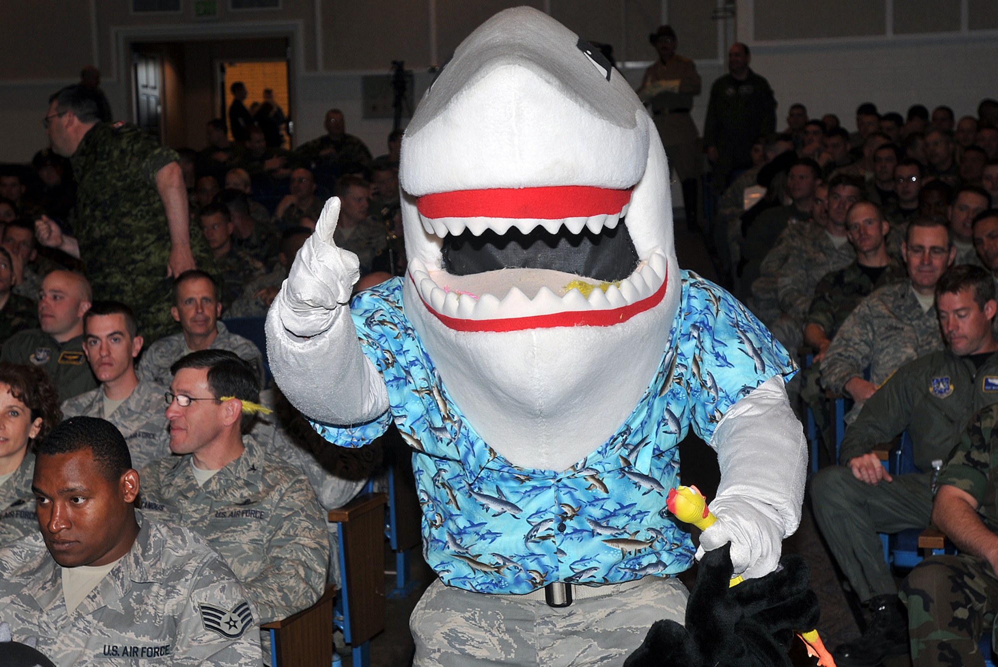 Snark the Shark, the mascot of the 45th Space Wing, based at Patrick Air Force Base, Fla., rallies his team’s members May 8 during the Guardian Challenge 2008 opening ceremony at Peterson Air Force Base, Colo. The teams descended on Peterson May 7 as they prepared for three days of GC events, including a golf tournament, space and missile forum and awards and dinner banquet May 9. The Guardian Challenge competition pits the command’s several space wings against each other to see whose the “best of the best” in areas of expertise, including security forces, communications, missile combat or satellite operations. (U.S. Air Force photo/Larry Hulst)