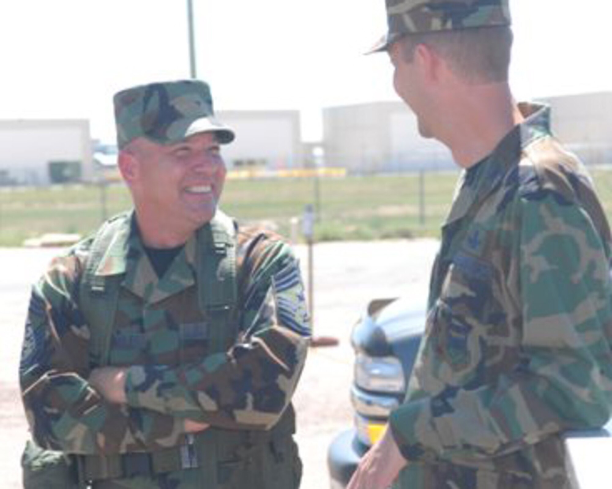 BUCKLEY AIR FORCE BASE, Colo. -- Chief Master Sgt. Kevin Candler, former 460th Space Wing command chief, departed Buckley, May 2, to become the command chief of the Ogden Air Logistics Center and 75th Air Base Wing at Hill AFB, Utah.

Chief Candler arrived here in June 2006 and almost immediately started drinking the "space Kool-Aid." He could be frequently seen around base delivering his war cry, "spacepower!" and shaking the hands of Airmen and pausing to say hello and see how they were doing.

"I have tried to be the example of 'responsibility' knowing that I am responsible to my country and the Air Force to take care of the greatest national treasure -- the people I lead every day -- America's sons and daughters," Chief Candler wrote in an e-mail addressed to the men and women of the 460th Space Wing.

Farewell Chief.

Spacepower!

(U.S. Air Force photo by Senior Airman Logan Tuttle)