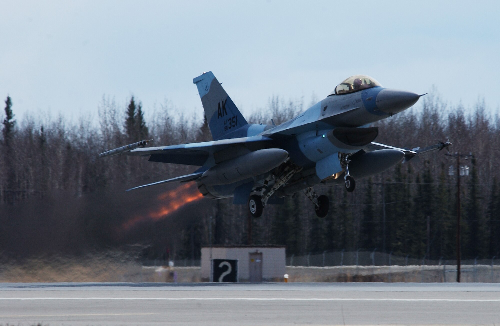 A F-16 Aggressor with a flanker scheme takes off for a training mission over the Pacific Alaskan Range Complex May 7, 2008, at Eielson Air Force Base, Alaska during Northern Edge 08 exercise. This is a joint training exercise hosted by Alaskan Command and is one of a series of U.S. Pacific Command exercises that prepare joint forces to respond to crises in the Asian Pacific region. This aircraft is assigned to the 18th Aggressor Squadron. (U.S. Air Force Photo/Airman 1st Class Jonathan Snyder)