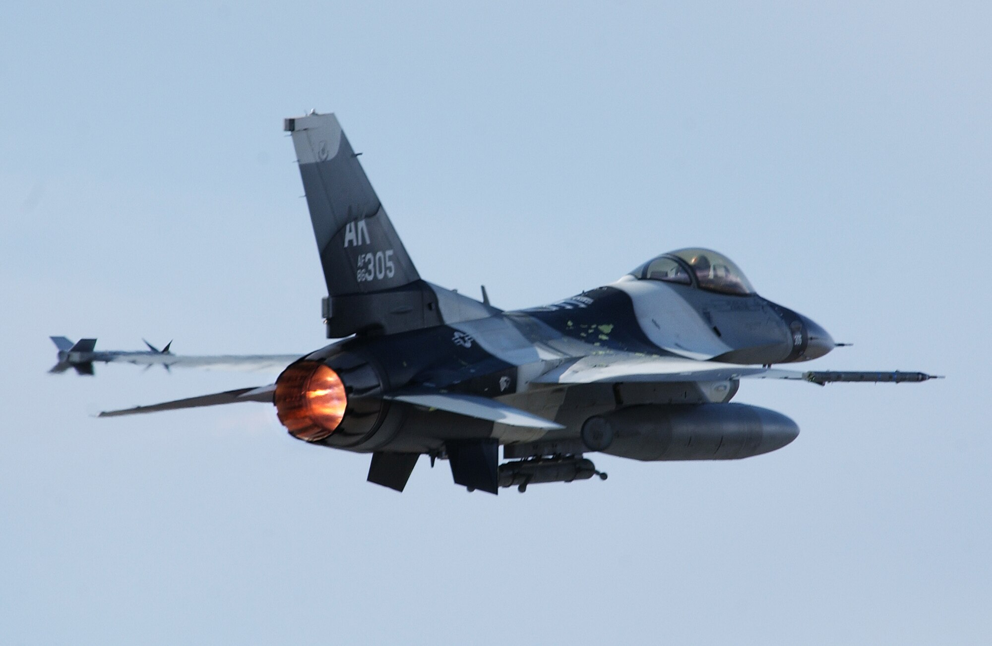 A F-16 Aggressor with an advance flanker scheme takes off for a training mission over the Pacific Alaskan Range Complex May 7, 2008, at Eielson Air Force Base, Alaska during Northern Edge 08 exercise. This is a joint training exercise hosted by Alaskan Command and is one of a series of U.S. Pacific Command exercises that prepare joint forces to respond to crises in the Asian Pacific region. This aircraft is assigned to the 18th Aggressor Squadron. (U.S. Air Force Photo/Airman 1st Class Jonathan Snyder)