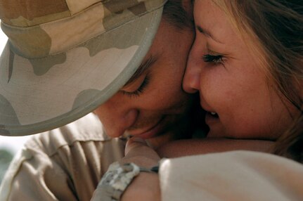 An Airman from the 823rd Security Forces Squadron hugs a loved one after returning from a deployment April 29 at Moody Air Force Base, Ga. Members of the 823rd SFS recently returned from a six-month deployment to Iraq. (U.S. Air Force photo/Senior Airman Gina Chiaverotti)
