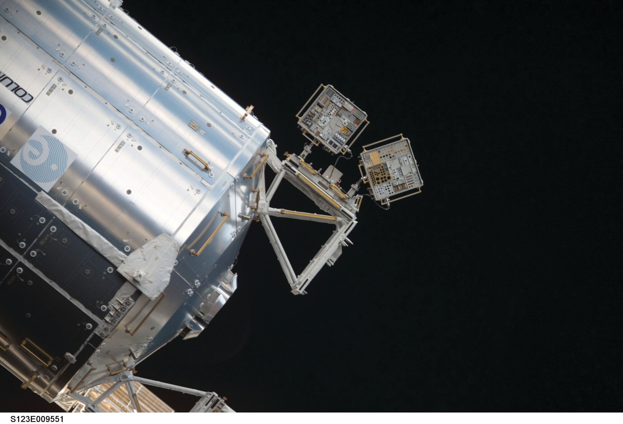 Two small, passive-experiment containers filled with new materials and mounted to the International Space Station for AFRL's sixth Materials International Space Station Experiment (NASA-provided photo)