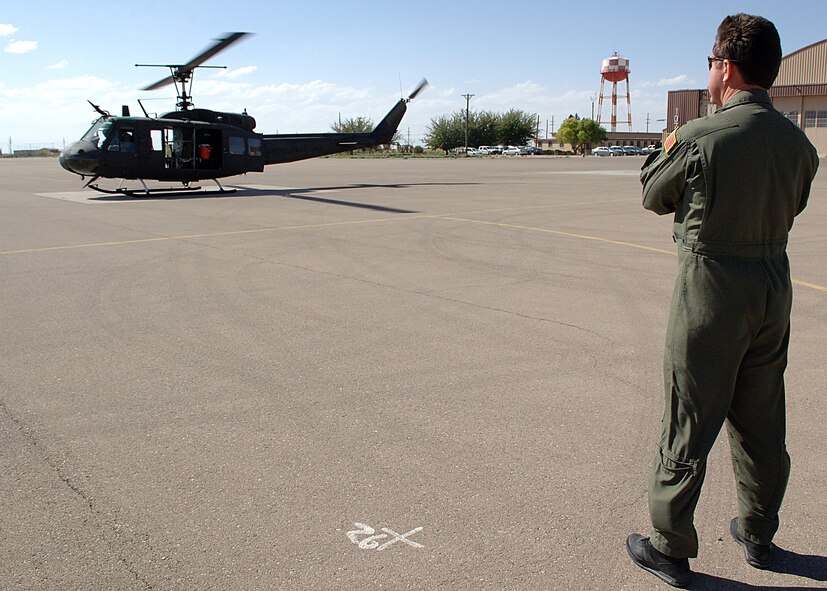 HOLLOMAN AIR FORCE BASE, N.M.--Mr. Jon Edwards, Army Air Branch Range Operations and Range Control chief, looks on as the UH-1H helicopter prepares to take flight May 6, 2008, here. (U.S. Air Force photo/Airman 1st Class John D. Strong II)