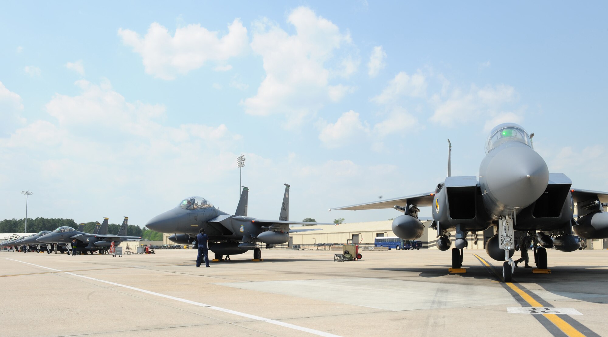 A row of F-15E Strike Eagles from the 4th Fighter Wing sit on the flightline May 7.  The jets have been deployed for eight months in support for Operation Enduring Freedom. (US Air Force photo by Airman First Class Salma Nebot)
