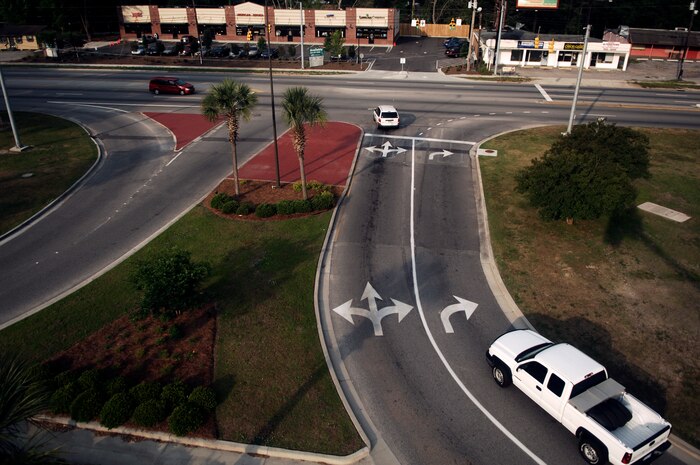 The new traffic pattern at the front gate allows motorists to turn right, left or go straight from the left lane. Motorists turning right onto Dorchester road should stay in their own lanes while making the turn off the base.  (U.S. Air Force photo/Senior Airman Nicholas Pilch)