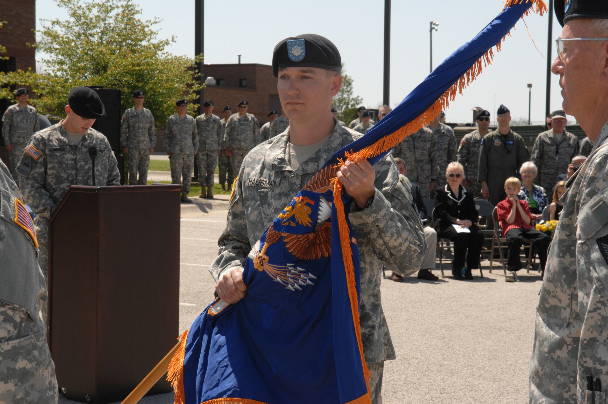 WHITEMAN AIR FORCE BASE, Mo. — Lt. Col. Charles Hausman receives the 1/135 Attack Reconnaissance Battalion flag during the unit’s change of command May 4. The passing of the flag symbolizes Colonel Hausman’s assumption of command. (U.S. Air Force photo/Senior Airman Stephanie Clark)  