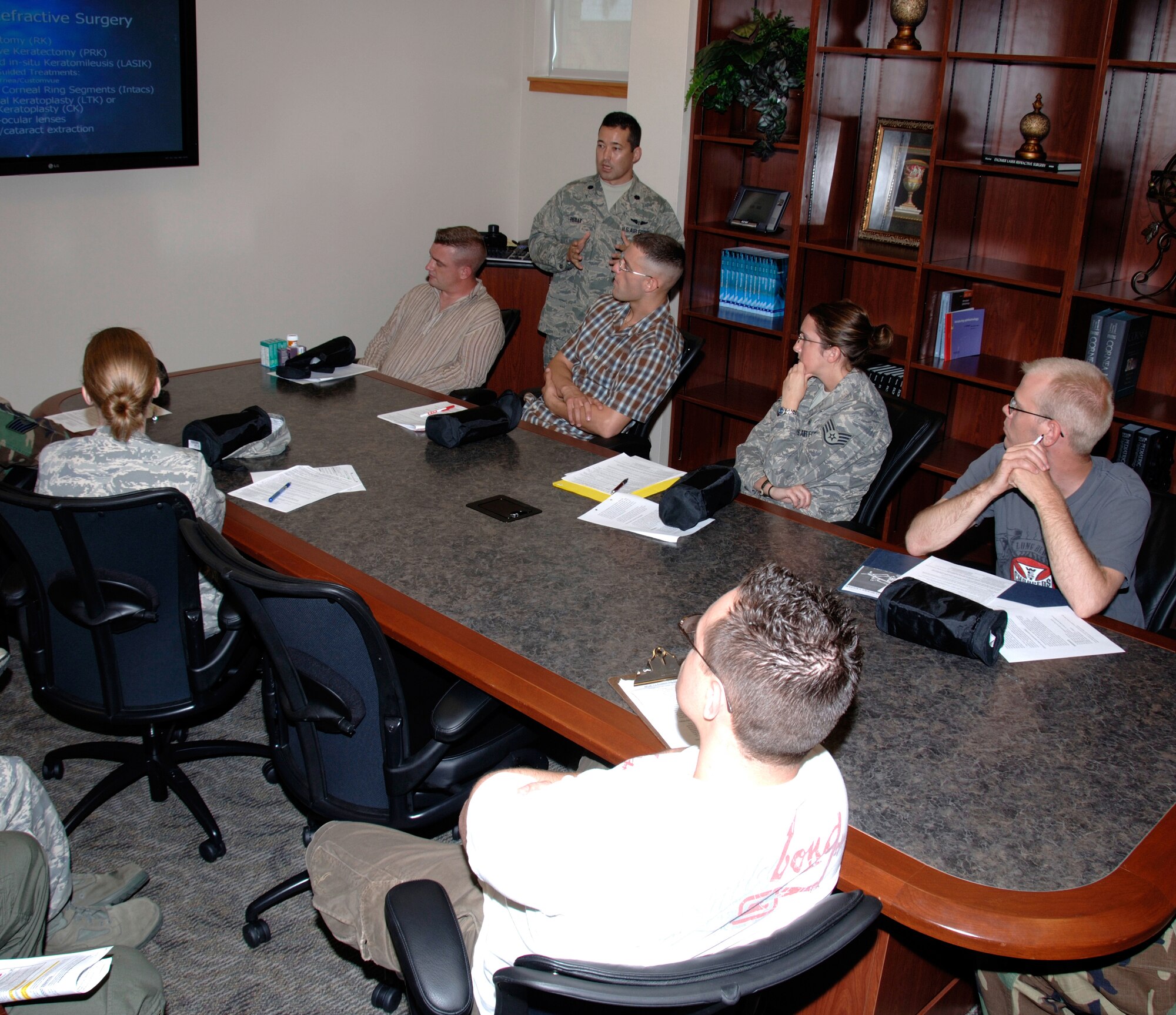 Lt. Col. (Dr.) Charles Reilly (standing), provides information about laser surgery to a group prior to their surgeries at a mass briefing held May 6 at the Joint Warfighter Refractive Surgery Center, Lackland Air Force Base, Texas. Dr. Reilly is the consultant to the Air Force Surgeon General for refractive surgery. (U.S. Air Force photo/Master Sgt. Kimberly A. Yearyean-Siers)