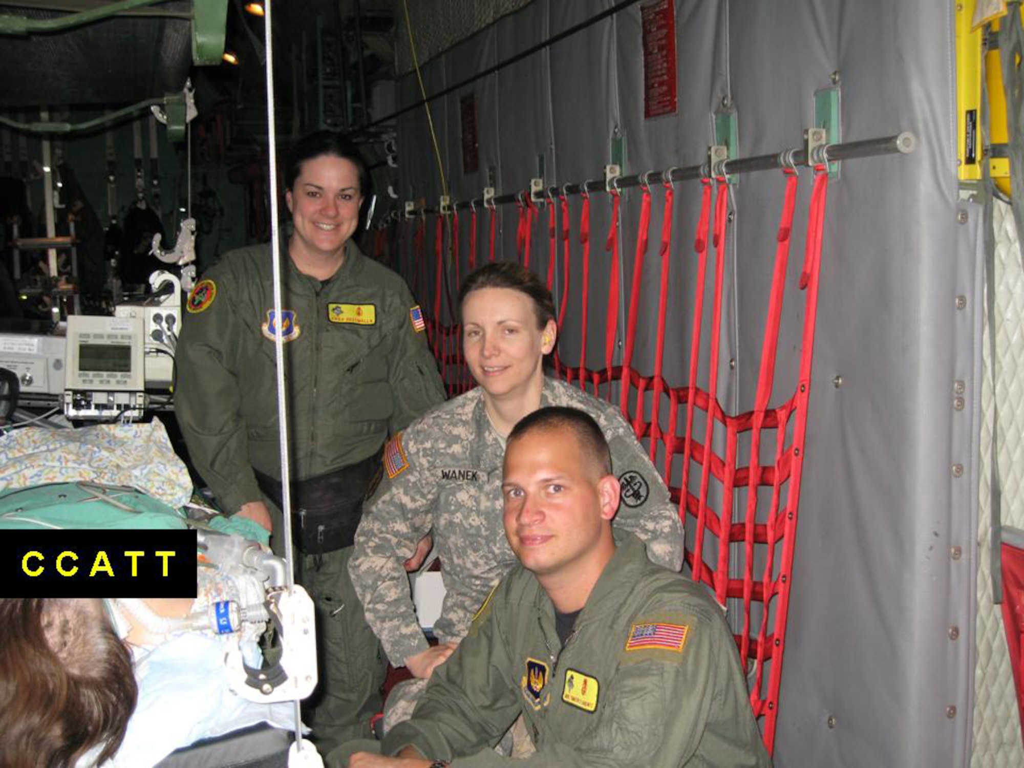 Maj. Sandra Wanke, Landstuhl Regional Medical Center surgeon (middle), Capt. Erika Dryzmalla, 435th Medical Squadron critical care nurse and Master Sgt. Timothy Carentz, 435th MDS, registered respiratory therapist transport a stabilized critically injured patient from Tel-Aviv, Israel, to Souda Bay, Greece, then on to Ramstein.and Landshuhl Regional Medical Center.(Courtesy photo)