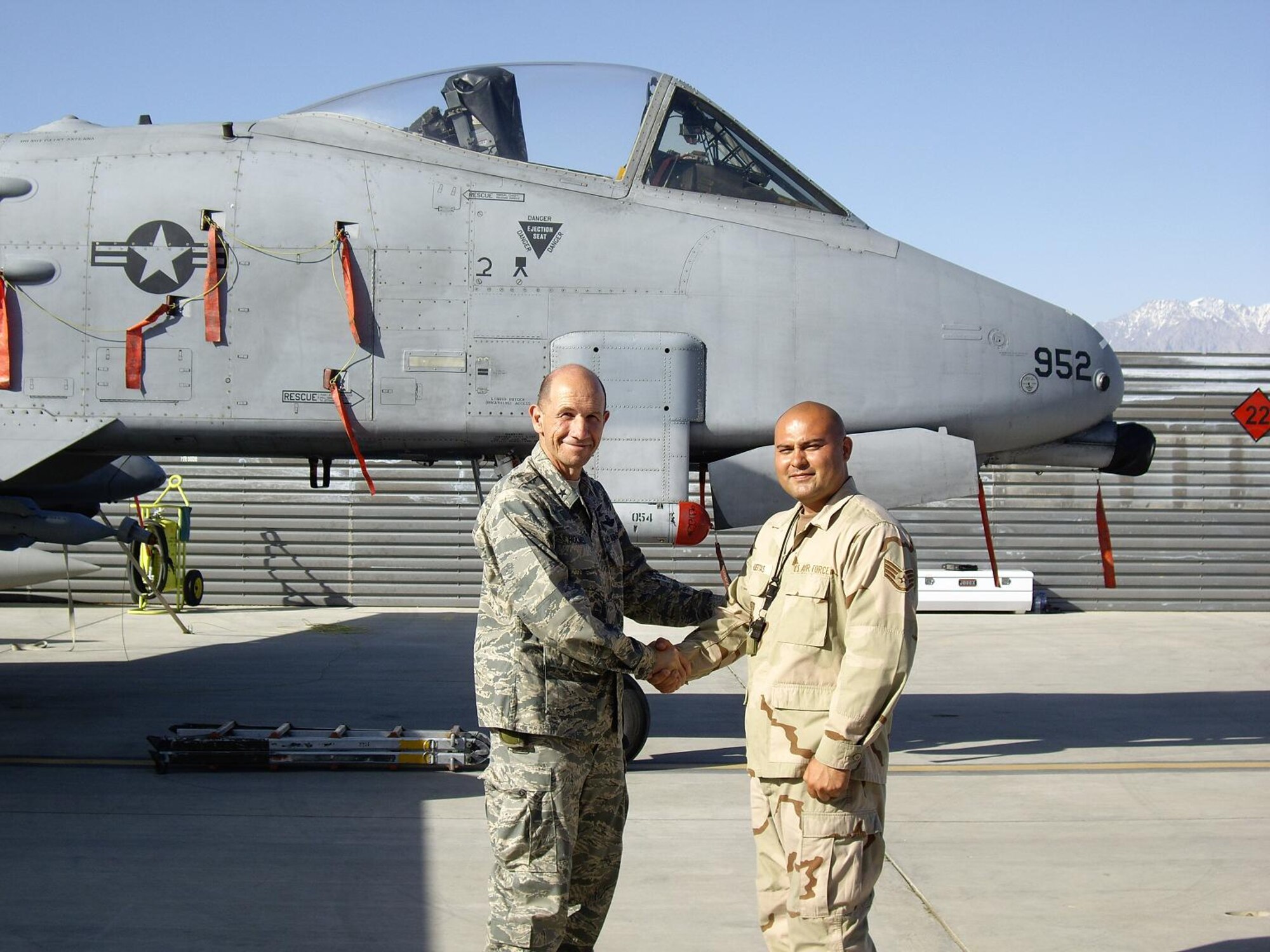 BAGRAM AIR BASE, Afghanistan -- Staff Sgt. Edwin Huertas, A-10 engine specialist, was recently coined by the 455th Air Expeditionary Wing commander, Brig. Gen. James M. Holmes, for his exemplary leadership and dedication to the mission in support of Operation Enduring Freedom. Sergeant Huertas is deployed from Spangdahlem Air Base, Germany. (Courtesy photo)
