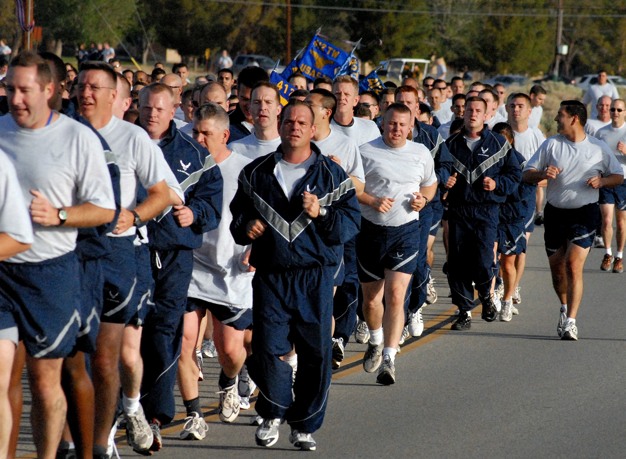 EDWARDS AIR FORCE BASE, Calif. -- Airmen from the 412th Test Wing run during an installation fitness run here May 9. More than 700 Airmen from the Air Force Flight Test Center participated in the 1.5-mile fitness run to promote fitness and esprit de corps. (Air Force photo by Master Sgt. Eric M. Grill)