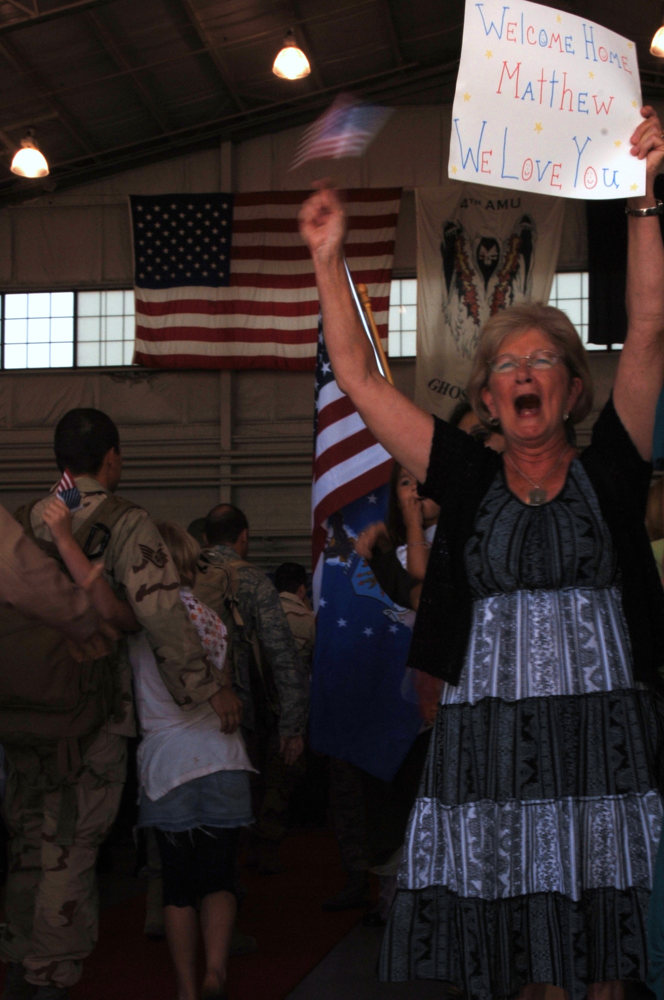 Family and friends gathered in the Commando Hangar on Hurlburt Field May 8 to welcome loved ones during Operation Homecoming . Approximately 250 Airmen returned from deployments to the Middle East. (U.S. Air Force photo/Senior Airman Emily Moore)