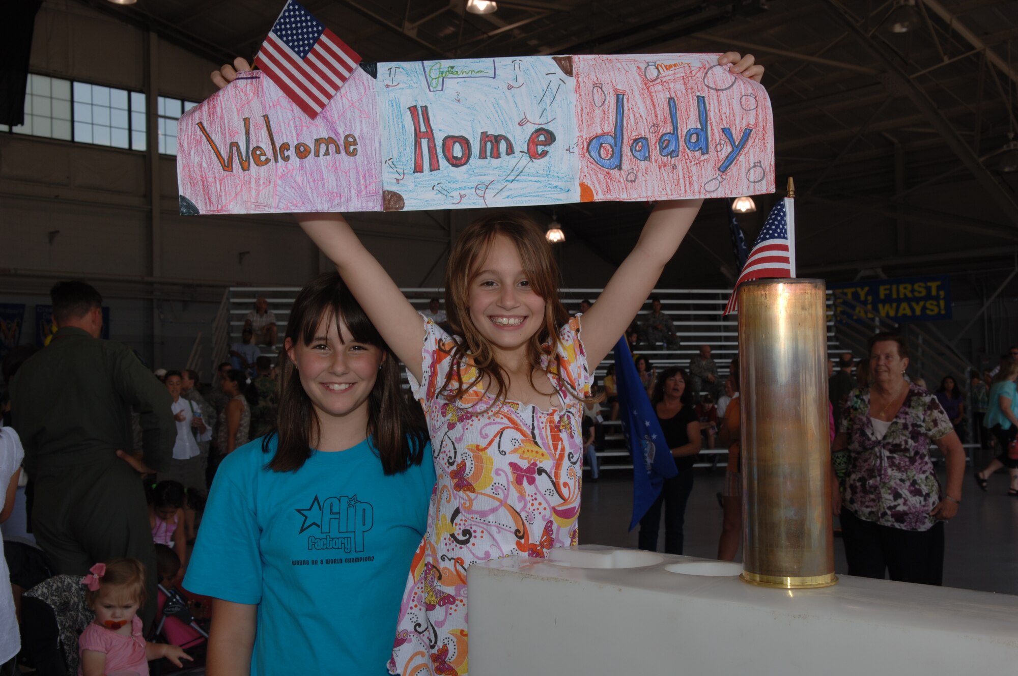 Family and friends gathered in the Commando Hangar on Hurlburt Field May 8 to welcome loved ones during Operation Homecoming . Approximately 250 Airmen returned from deployments to the Middle East. (U.S. Air Force photo/Senior Airman Emily Moore)