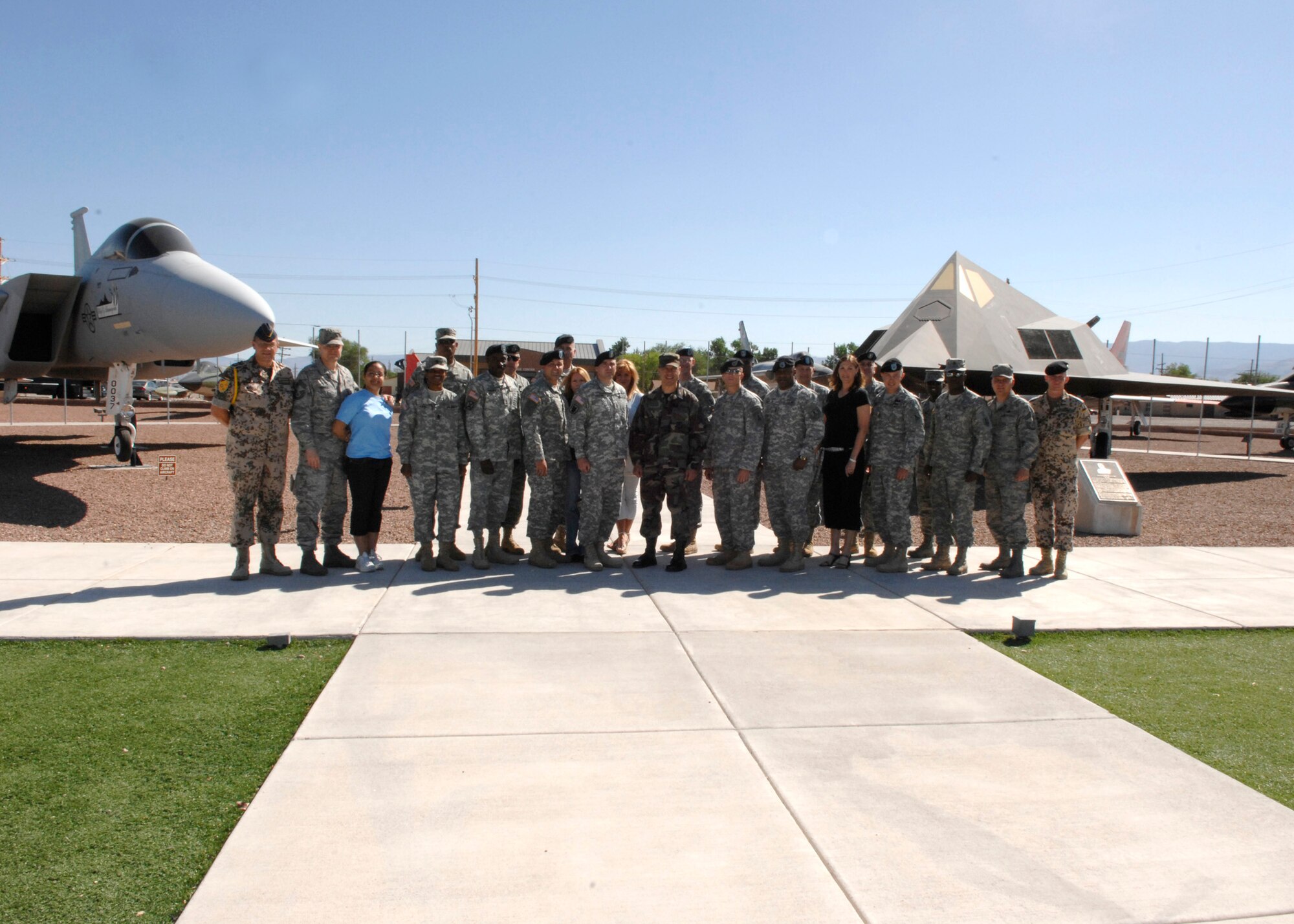 HOLLOMAN AIR FORCE BASE, N.M.,-- U.S. Army Master Sergeants pose for a group photo at Heritage Park during a base tour here May 6. They are soon preparing to graduate from a ten month long Sergeant Major Academy at Fort Bliss, Texas. (U.S. Air Force photo/Airman 1st Class Rachel A. Kocin)