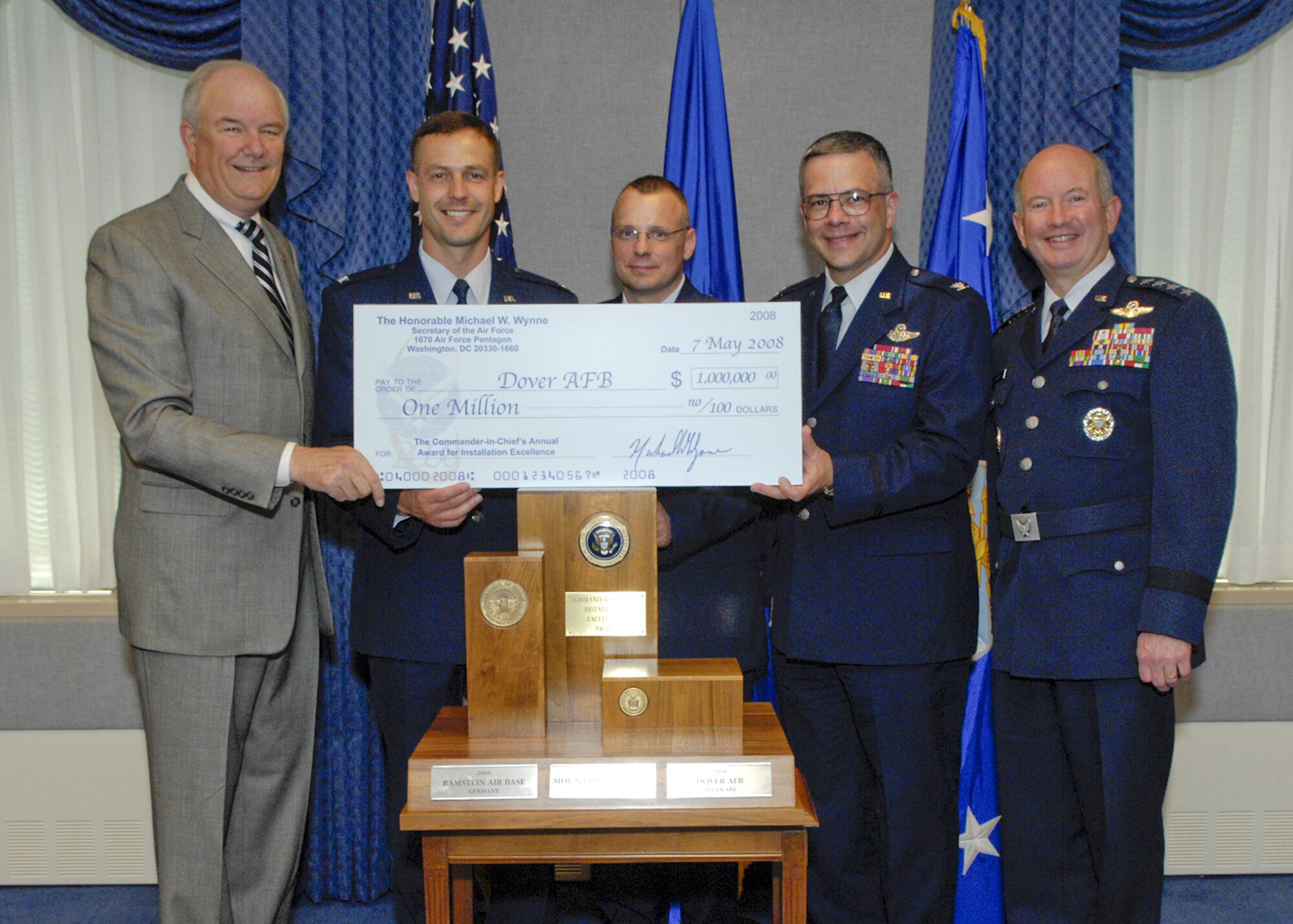 From left: Secretary of the Air Force Michael Wynne, Col. Steven Harrison, 436th Airlift Wing commander, Chief Master Sgt. John Wood, 436th AW command chief, Col. Randal Bright, 512th AW commander, and Vice Chief of Staff of the Air Force Gen. Duncan McNabb pose for a photo after Secretary Wynne and General McNabb presented Dover Air Force Base with the Commander-in-Chief’s Annual Award for Installation Excellence.  The award presentation by Air Force officials was held May 7 at the Pentagon, with a presentation by Under Secretary of Defense John Young, Jr., on May 8. Team Dover was was identified as making the most efficient use of the resources provided in order to further the unit's mission.  (U.S. Air Force Photo/Michael Pausic) 