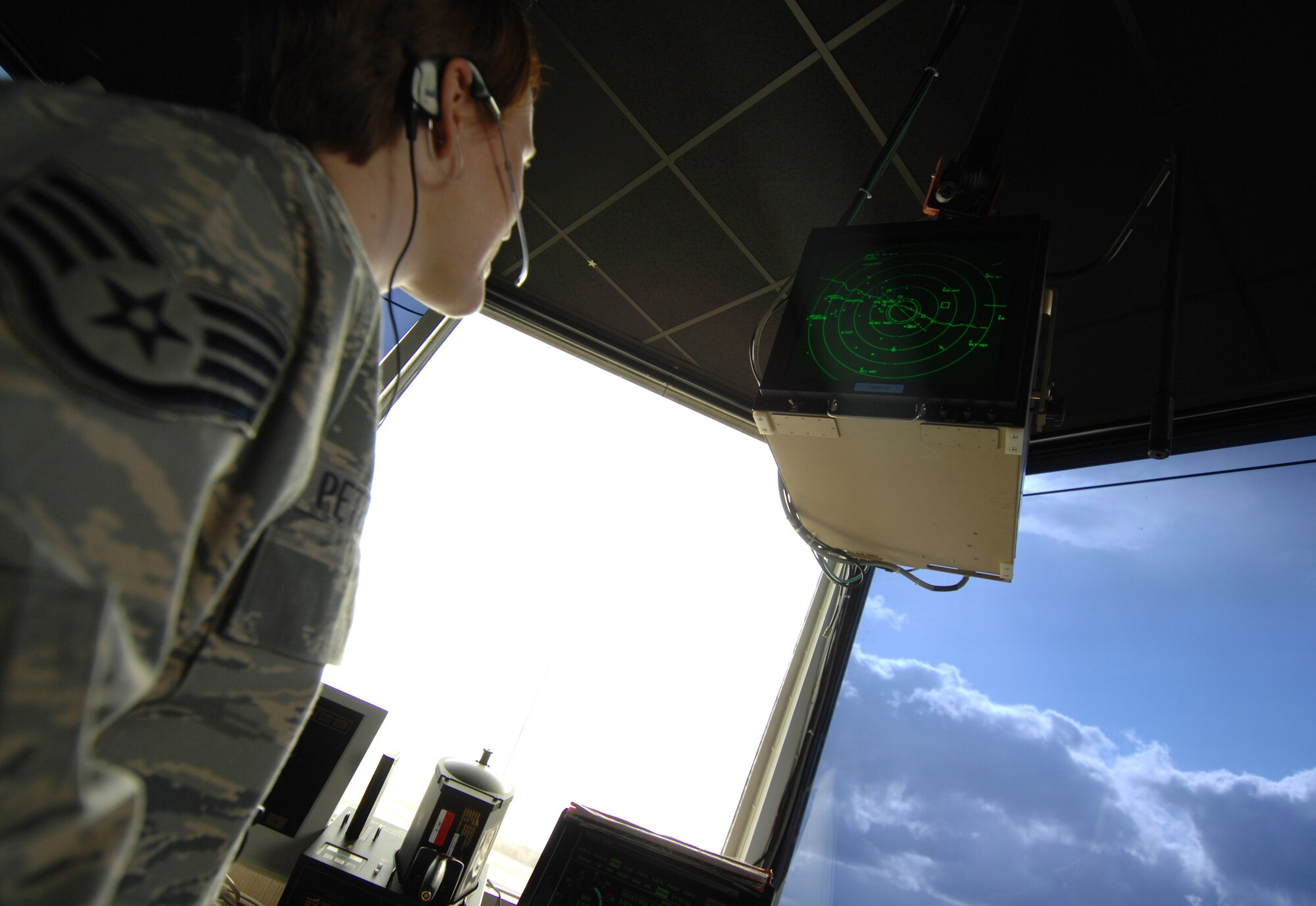 Staff Sgt. Kristen Peterson monitors the Digital Bright Radar Indicator Tower Equipment to view the latitude, longitude, and altitude so every aircraft launched from Eielson AFB, Alaska May 7, 2008. The DBRITE allows air traffic controllers to view the location of aircraft after communications with the aircraft cease due to the aircraft being out of range. Sergeant Peterson is an air traffic controller assigned to the 354th Operations Support Squadron.

(U.S Air Force Photo by Tech. Sgt Eric T. Sheler)
