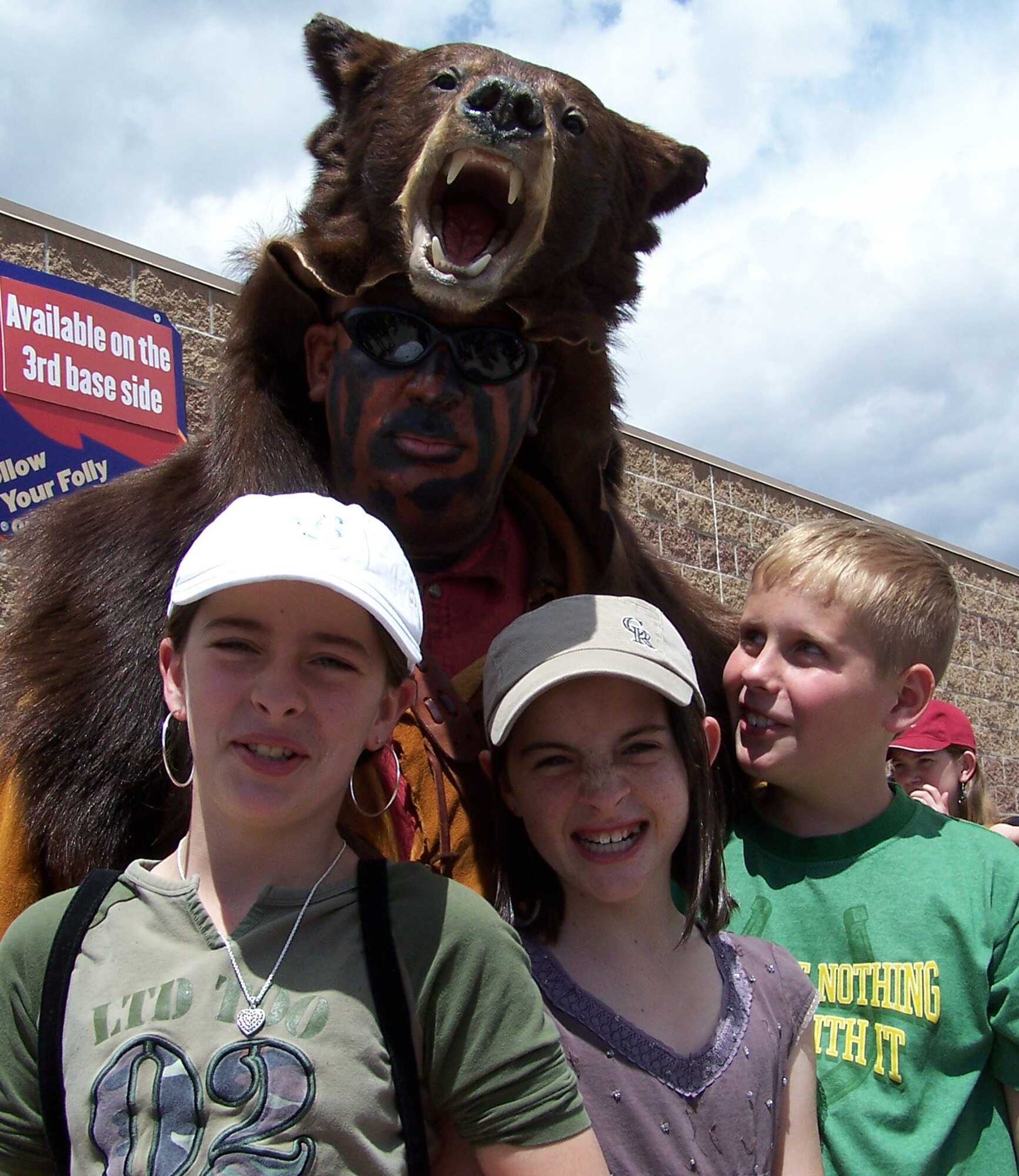 Grizz, mascot for the 341st Space Wing, based at Malmstrom Air Force Base, Mont., takes time out for snapshot with local fans at Security Service Field before a baseball game May 8 in Colorado Springs, Colo. Guardian Challenge team members descended upon the stadium as the teams prepared for three days of GC events, including a golf tournament, space and missile forum and awards and dinner banquet May 9. The Guardian Challenge competition pits the command’s several space wings against each other to see who’s the “best of the best” in areas of expertise, including security forces, communications, missile combat or satellite operations. (U.S. Air Force photo/Master Sgt. Matt Gilreath)