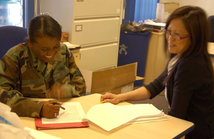 RAF MILDENHALL, England --Tech. Sgt. Trinette Price, 459th Logistics Readiness Flight, and Aurora Moore, 100th Logistics Readiness Squadron, conduct supply systems analysis here April 14. Thirty-one members of the 459th Logistics Readiness Flight, 459th Communications Flight, 459th Mission Support Group and the 69th Aerial Port Squadron spent their annual tour here to support U.S. Air Forces in Europe taskings for the rural area mission, about 80 miles outside of London. (U.S. Air Force photo/Staff Sgt. Amaani Lyle)
