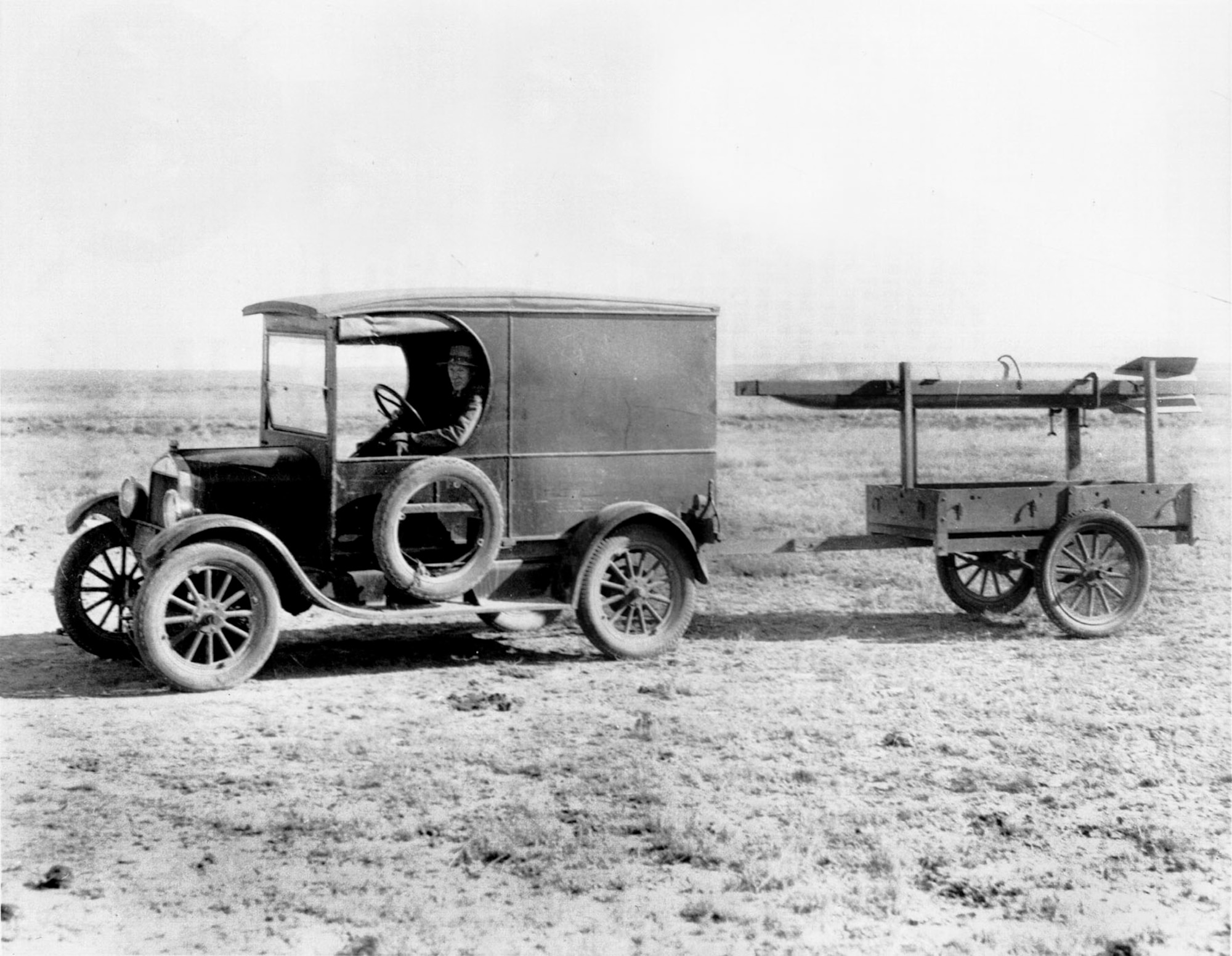 Goddard tows a rocket to its launch tower near Roswell, N.M., around 1932. (U.S. Air Force photo)