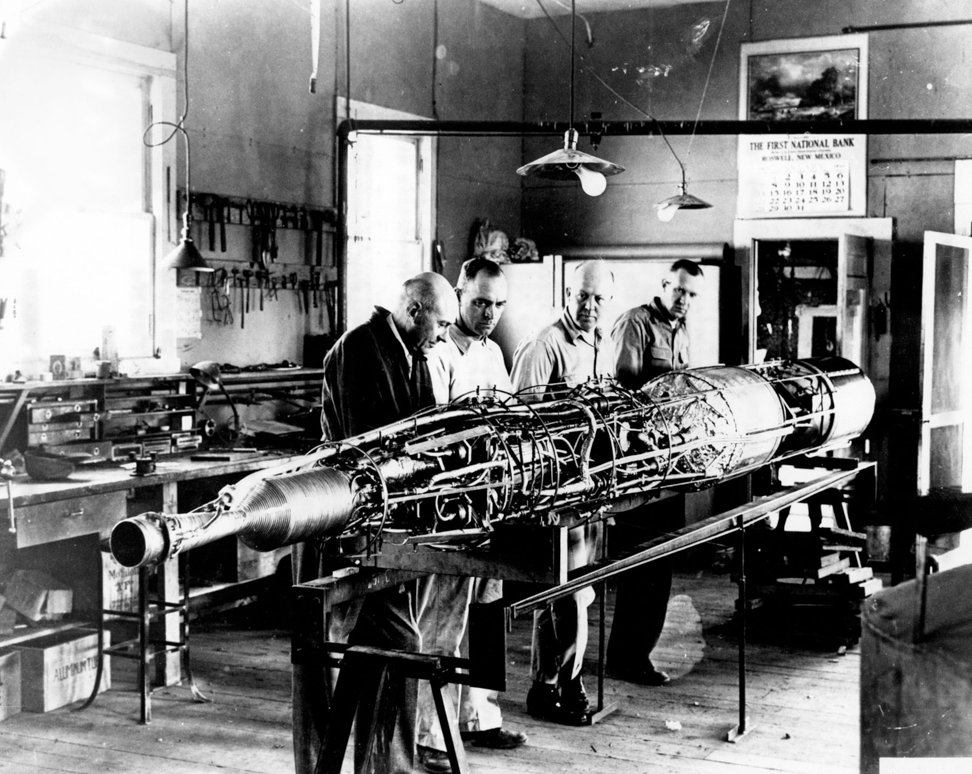 Goddard and his team work on a rocket without its out casing in Roswell, N.M. in 1940. Left to right are Goddard, machinist Nils Ljungquist, machinist and Goddard’s brother-in-law Albert Kisk; and welder Charles Mansur. (U.S. Air Force photo)