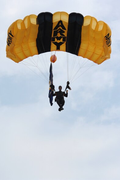 BARKSDALE AIR FORCE BASE, La. -- U.S. Army Staff Sgt. Justin Blewitt, Golden Knights Parachutist, escorts the U.S. Flag to the Barksdale Air Force Base flight line during the opening ceremony of the 2008 Defenders of Liberty Air Show.  The Air Show commemorates the 75th anniversary of Barksdale Air Force Base.  (U.S. Air Force photo by TSgt Laura K. Smith)