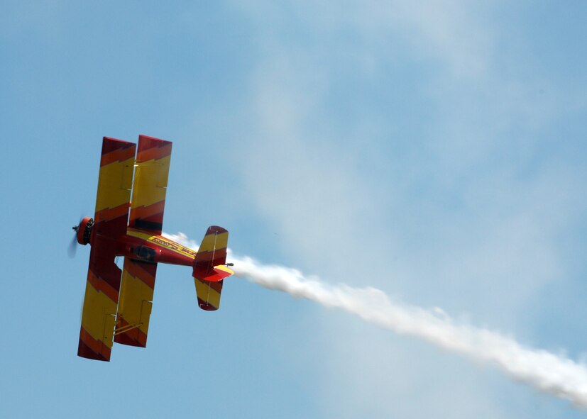 Gene Soucy performs stunts high above the ground for the crowds of Air Force members and the general public at Barksdale Air Force Base, Louisiana, on April 21, 2007. This event was part of the Defender's of Liberty Air Show 2007 held at Barksdale this weekend. (U.S. Air Force photo by Airman 1st Class Joanna M. Kresge)